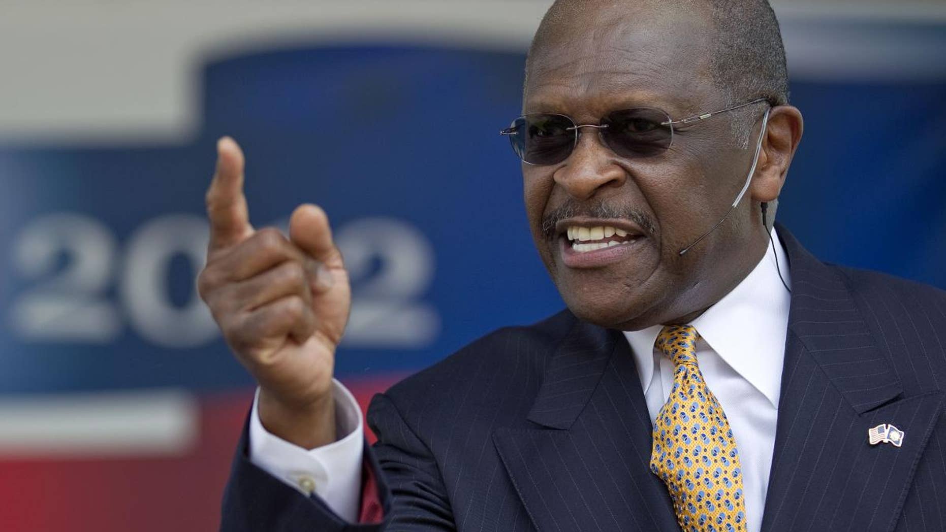 Herman Cain announces his run for Republican candidate for president at a rally Saturday, May 21 in Atlanta. (AP Photo/David Goldman)