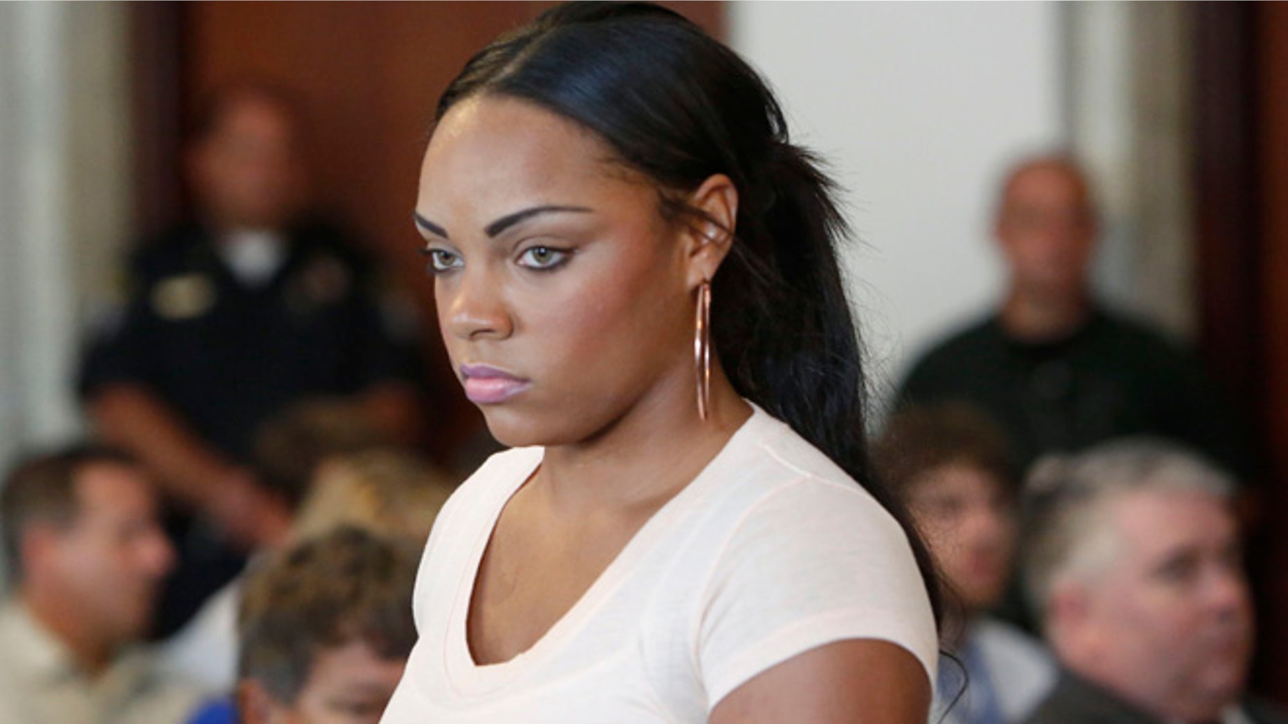 July 24, 2013: In this file photo, Shayanna Jenkins, girlfriend of former New England Patriot Aaron Hernandez, arrives at hearing for Hernandez at Attleboro District Courtroom in Attleboro, Mass.