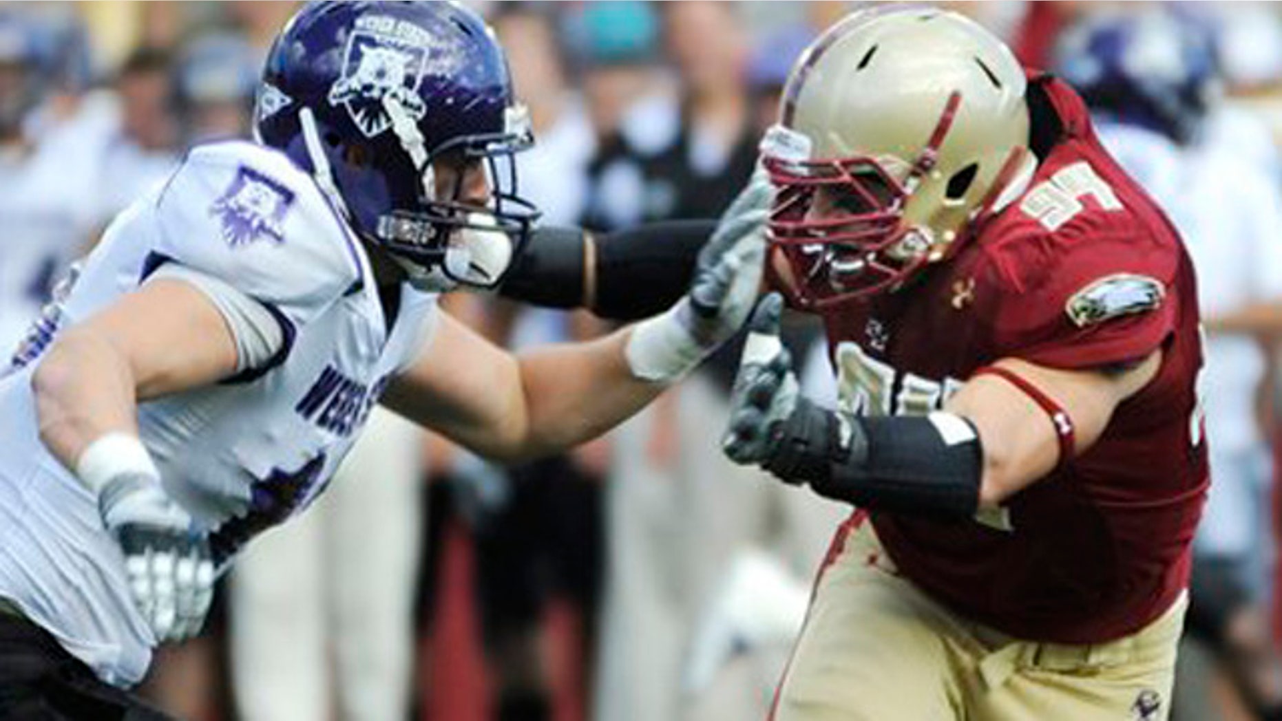 In this Sept. 4, 2010, file photo, Boston College's Mark Herzlich, right, rushes against Weber State's Brian Jankowski during an NCAA college football game in Boston. Herzlich is heading into the NFL draft after missing a season with BC because of cancer. The linebacker returned to play in 2010 and is one of 25 college players scheduled to attend the draft in New York that begins Thursday night, April 27.