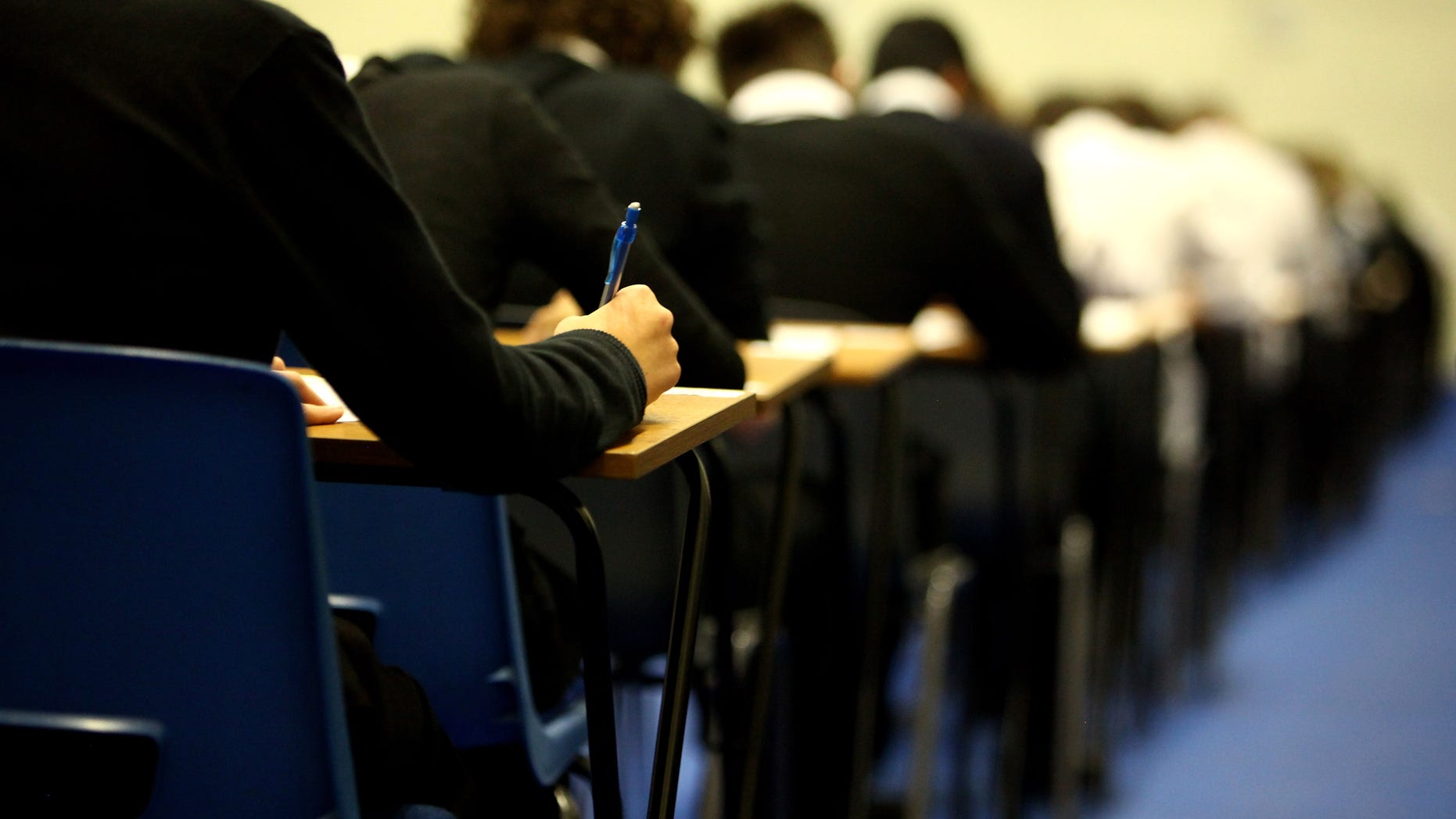 GLASGOW, UNITED KINGDOM - FEBRUARY 05: Pupils at Williamwood High School sit prelim exams on February 5, 2010 in Glasgow, Scotland As the UK gears up for one of the most hotly contested general elections in recent history it is expected that that the economy, immigration, the NHS and education are likely to form the basis of many of the debates. (Photo by Jeff J Mitchell/Getty Images)