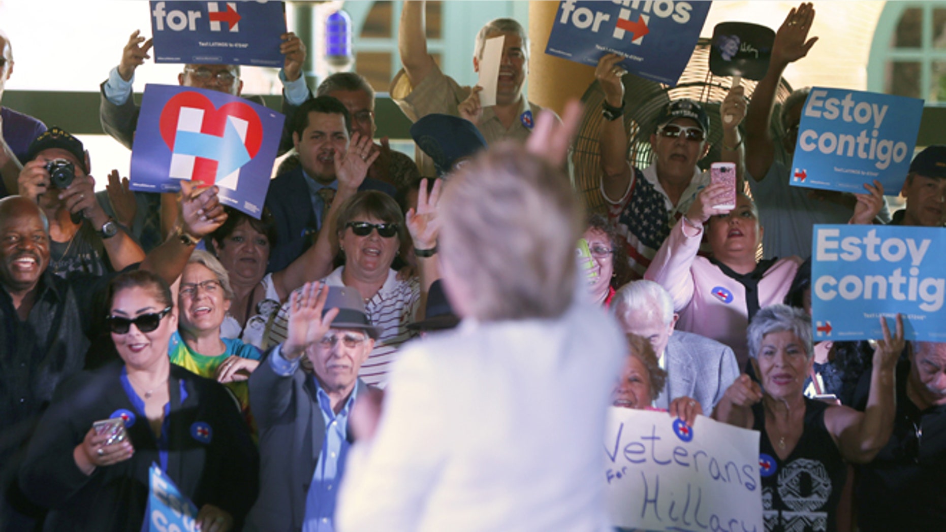 SAN ANTONIO, TX - OCTOBER 15: Democratic U.S. presidential hopeful Hillary Clinton acknowledges supporters at a "Latinos for Hillary" grassroots event October 15, 2015 in San Antonio, Texas. The event was part of the campaign's ongoing effort to build an organization outside of the four early states and work hard for every vote. (Photo by Erich Schlegel/Getty Images)