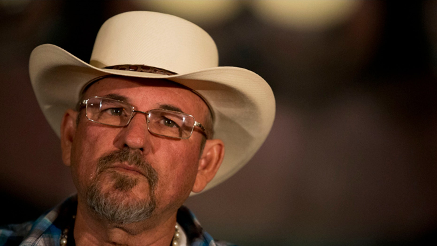 FILE - In this May 28, 2014, file photo, Hipolito Mora, leader of a Michoacan vigilante group, participates in a national meeting of self-defense groups, in Mexico City. Mora, a founder of one of the groups that rose up to confront drug traffickers in the state more than a year ago, said Tuesday Dec. 16, 2014, in a television interview that his group was attacked by a heavily armed rival. The clash occurred at the entrance to the town of La Ruana. Mora said that five or six people were killed, including his son. (AP Photo/Rebecca Blackwell, File)