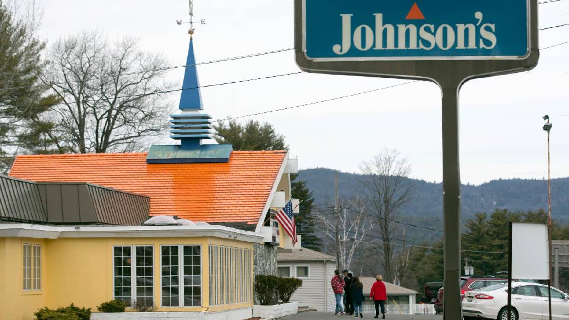 In this Wednesday, April 8, 2015 photo, customers walk into Howard Johnson's Restaurant in Lake George, N.Y. The HoJo’s on the main strip of the Adirondack Mountain resort town of Lake George and another in Bangor, Maine, are the last two restaurants operating under the famous name. (AP Photo/Mike Groll)