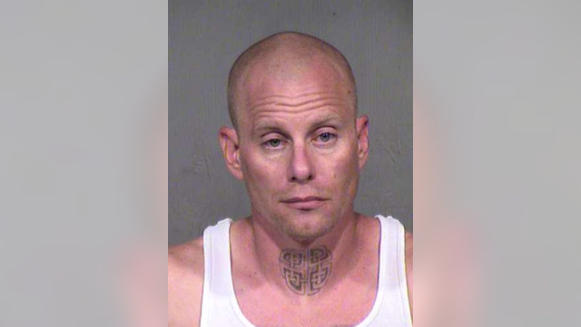 This photo shows Christopher Hoffman, arrested in connection with a drive-by road rage shooting in suburban Phoenix Saturday, Oct. 3, 2015. (Maricopa County Sheriff's Office)