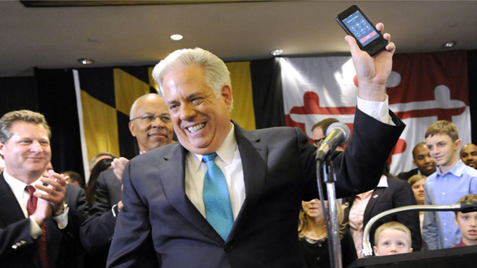 Nov. 5, 2014: Maryland Gov.-elect Larry Hogan, a Republican, gets a call from New Jersey GOP Gov. Chris Christie, Annapolis, Md.