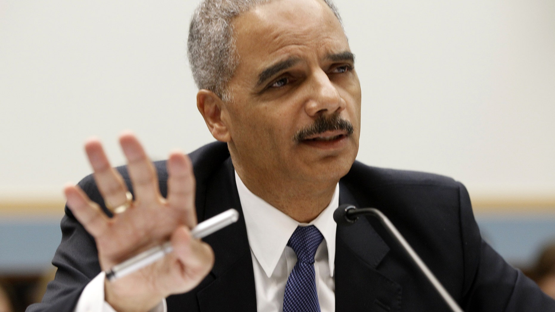 June 2012: Attorney General Eric Holder testifies on Capitol Hill in Washington, before the House Judiciary Committee oversight hearing on the Justice Department.