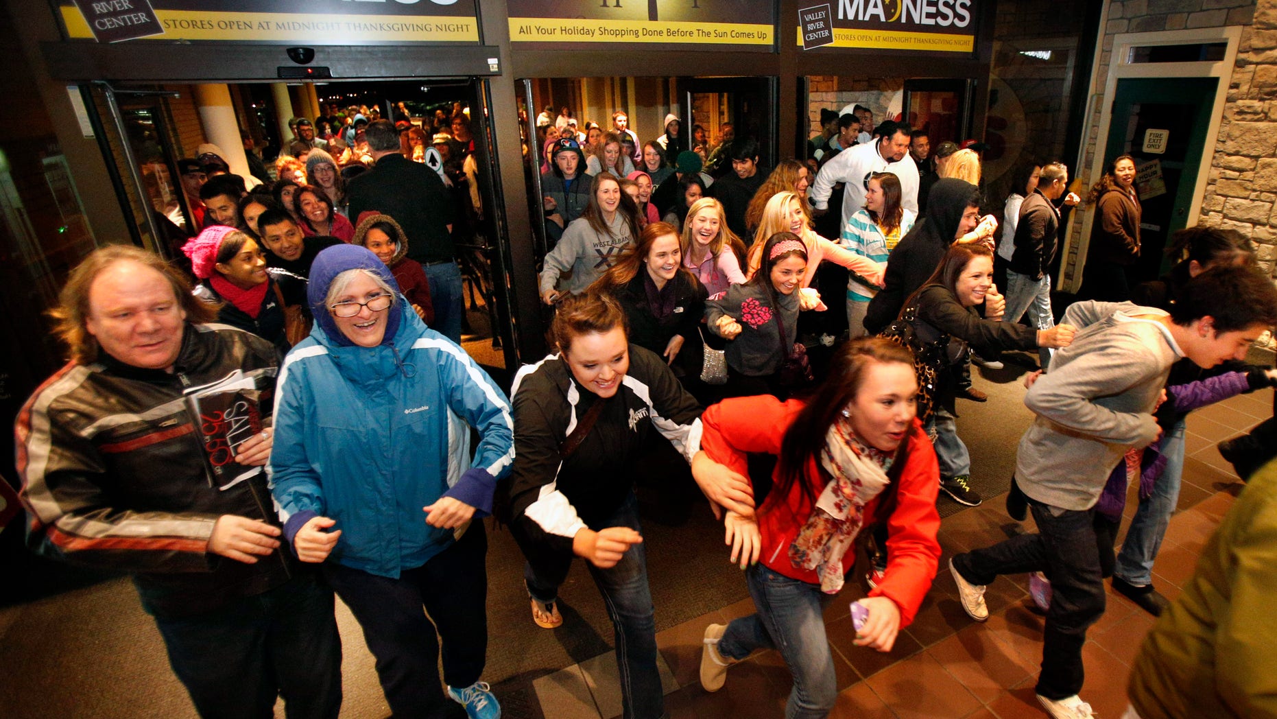 Nov. 23, 2012: Black Friday shoppers pour into the Valley River Center mall for the Midnight Madness sale, in Eugene, Ore.