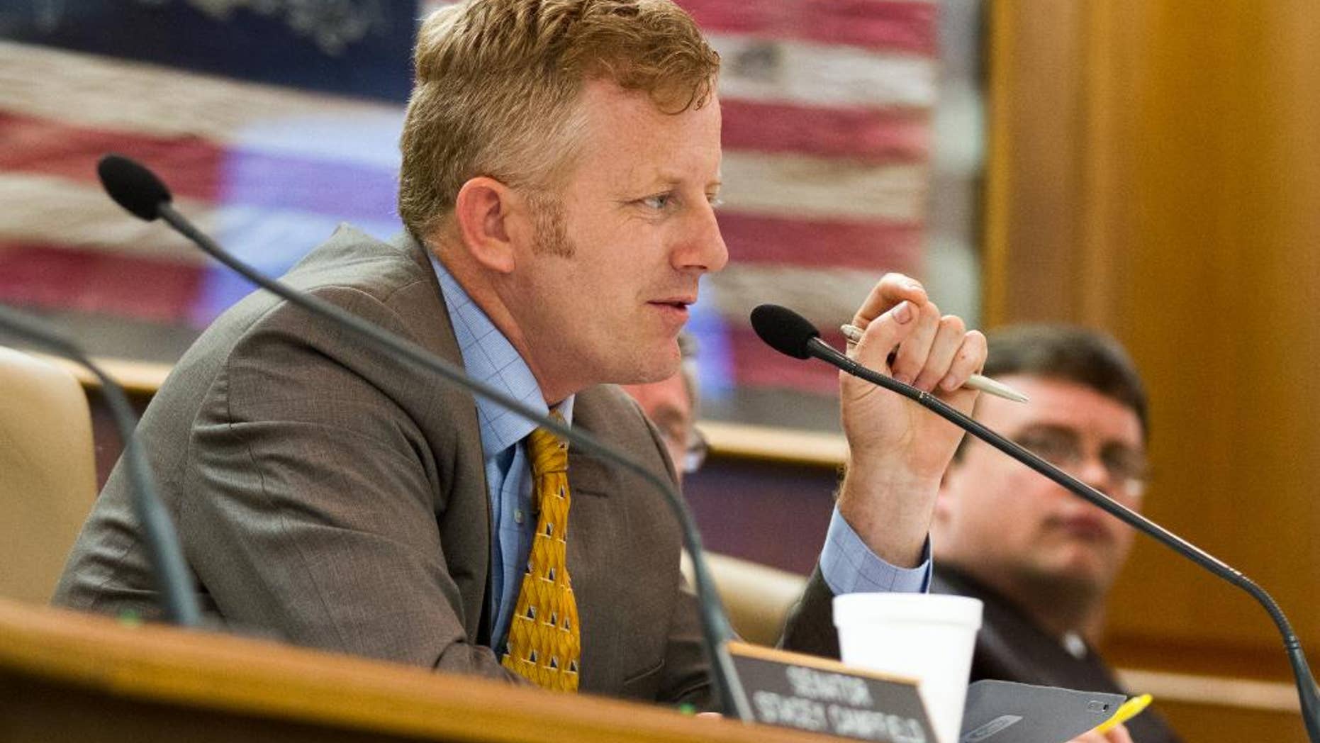 FILE - In this May 16, 2013, file photo, Republican state Sen. Stacey Campfield of Knoxville speaks at a Senate subcommittee hearing in Nashville, Tenn. Campfield was criticized by leaders of both the Republican and Democratic parties in Tennessee on Monday, May 5, 2014, for writing a blog post likening the insurance requirement under President Barack Obama's health care law to the forced deportation of Jews during the Holocaust. (AP Photo/Erik Schelzig, File)
