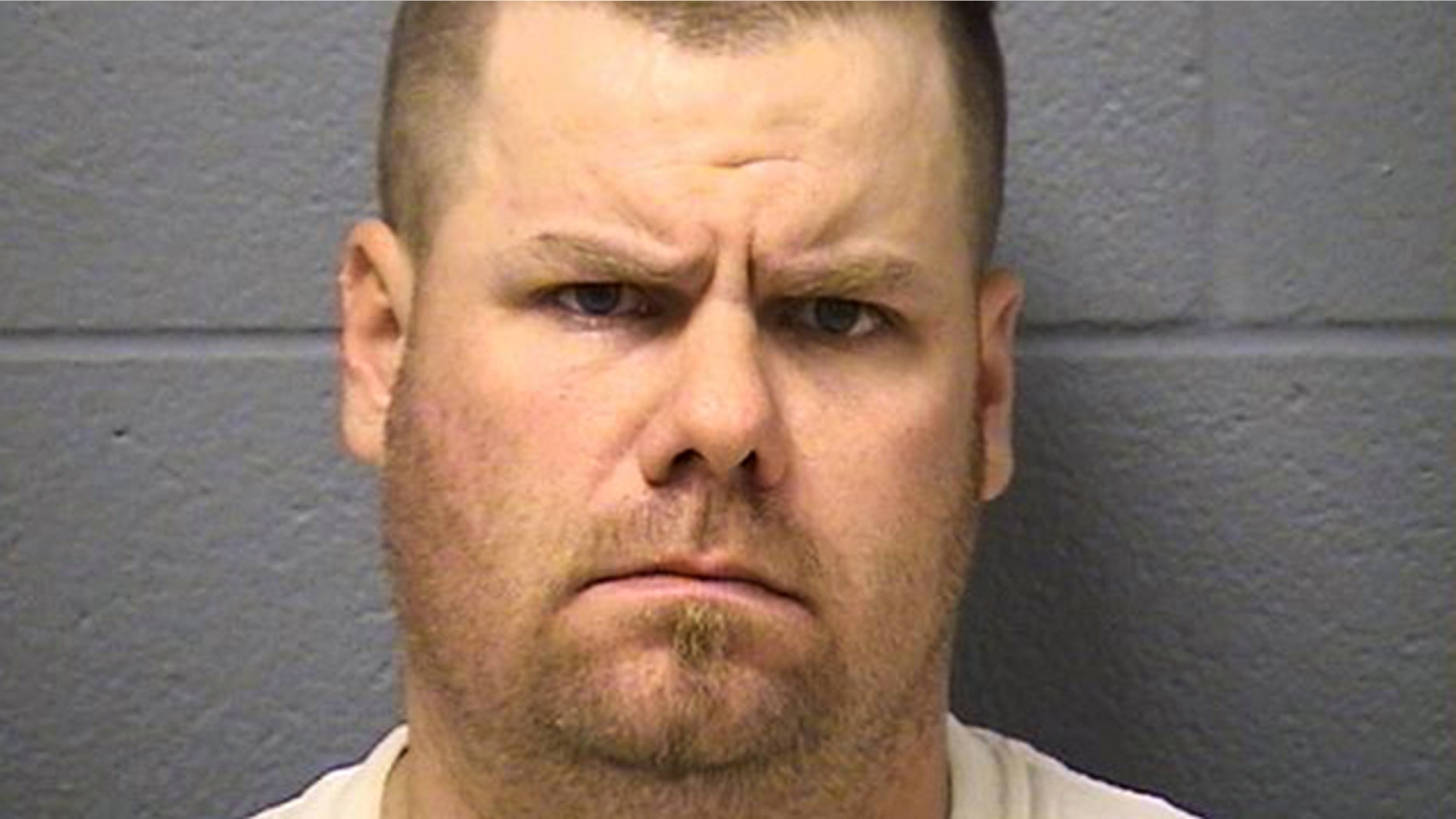 Brian Dorian, seen in this photo released by the Will County Sheriff's Office, is a former Illinois police officer suspected in a series of shootings that killed one man and wounded two others.