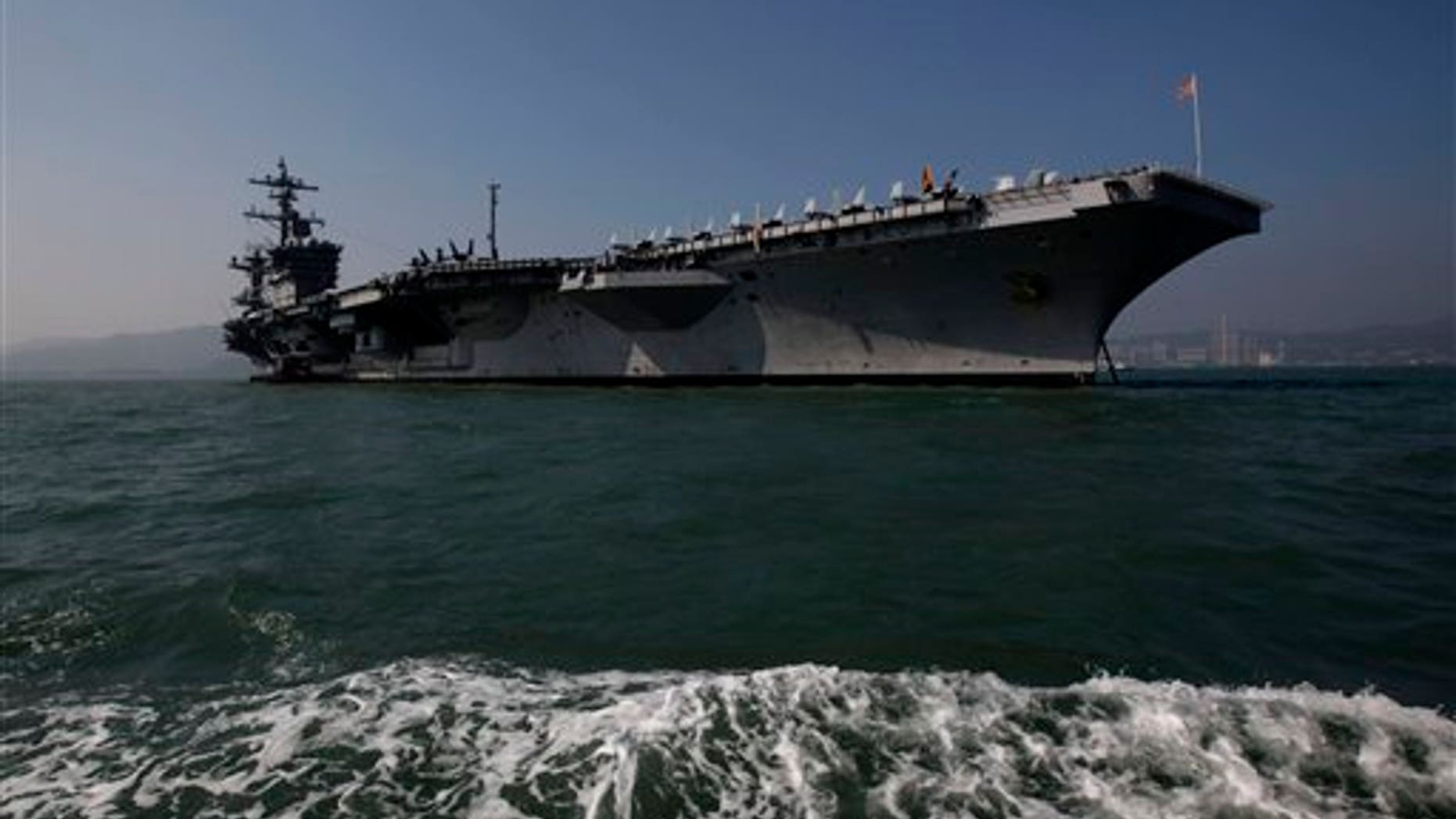 Dec. 27, 2011: The aircraft carrier USS Carl Vinson is anchored in Hong Kong water on its way to the Arabian Sea.