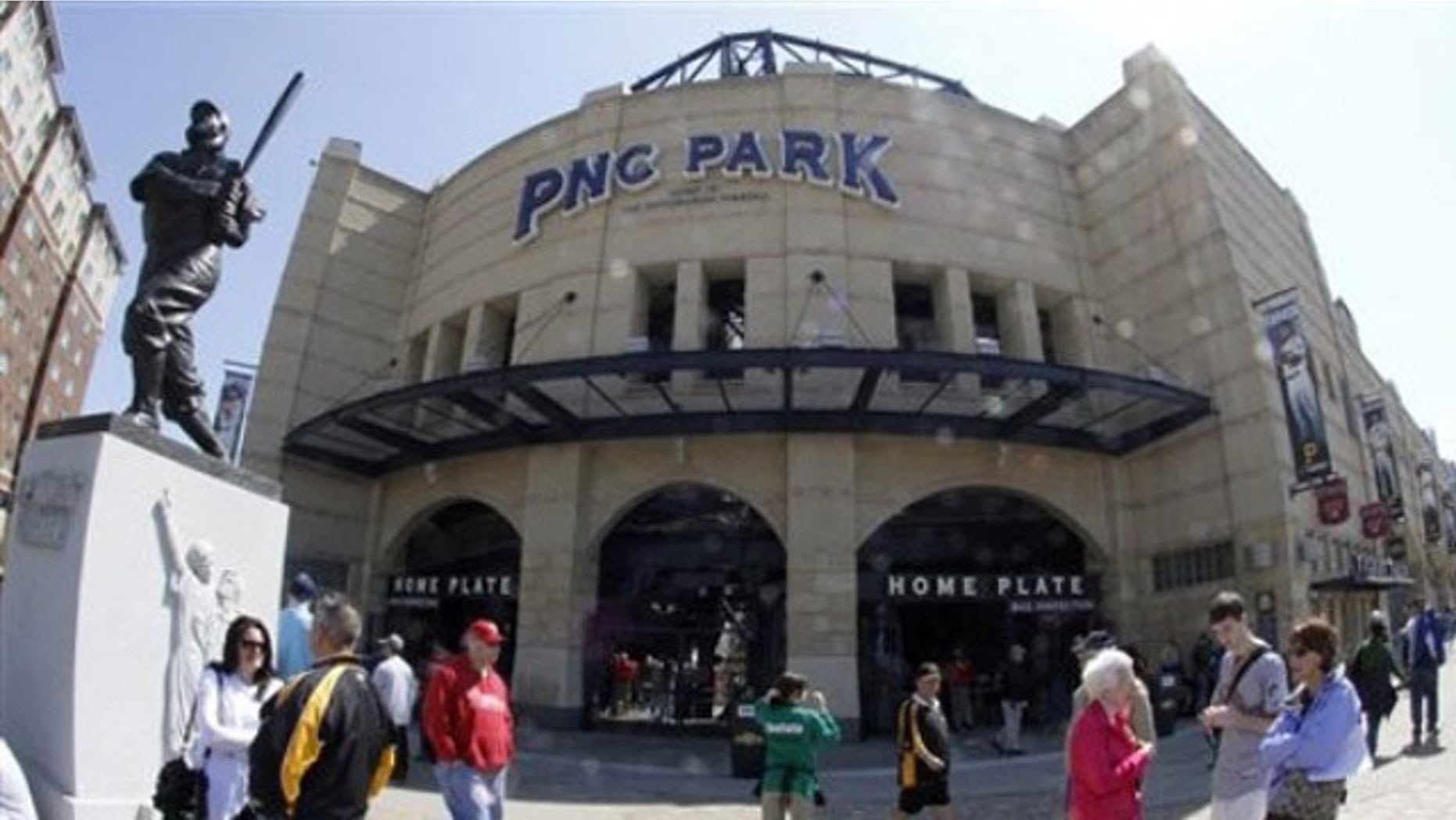 April 7, 2011: Fans mingle near the home plate entrance and the statue of former Pirates great Honus Wagner before the Pirates home opener baseball game against the Colorado Rockies in Pittsburgh.