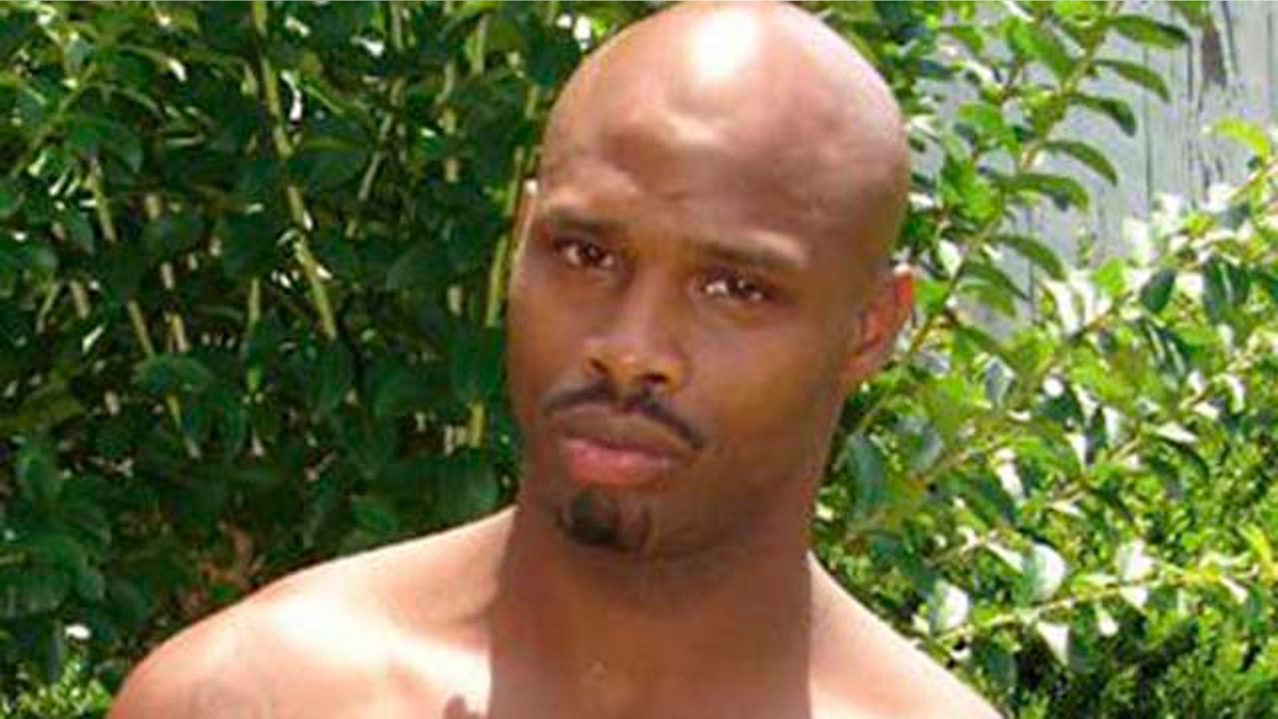 This image provided by the Clarke County Georgia Sheriff's department shows a photo of Jamie Hood, 33, who is charged in the slaying of a Georgia police officer and who allegedly held nine hostages at an Athens home days later. The 33-year-old Hood was being held Saturday March 26, 2011 without bond on murder and other charges.