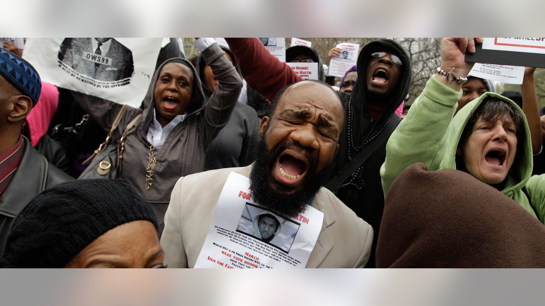 Demonstrators chant Trayvon Martin's name during the Million Hoodie March in Union Square Wednesday, March 21, 2012 in New York. The march was in memory of Martin, a black teenager shot to death by a Hispanic neighborhood watch captain in Florida. The teenager was unarmed and was wearing a hoodie. (AP Photo/Mary Altaffer)