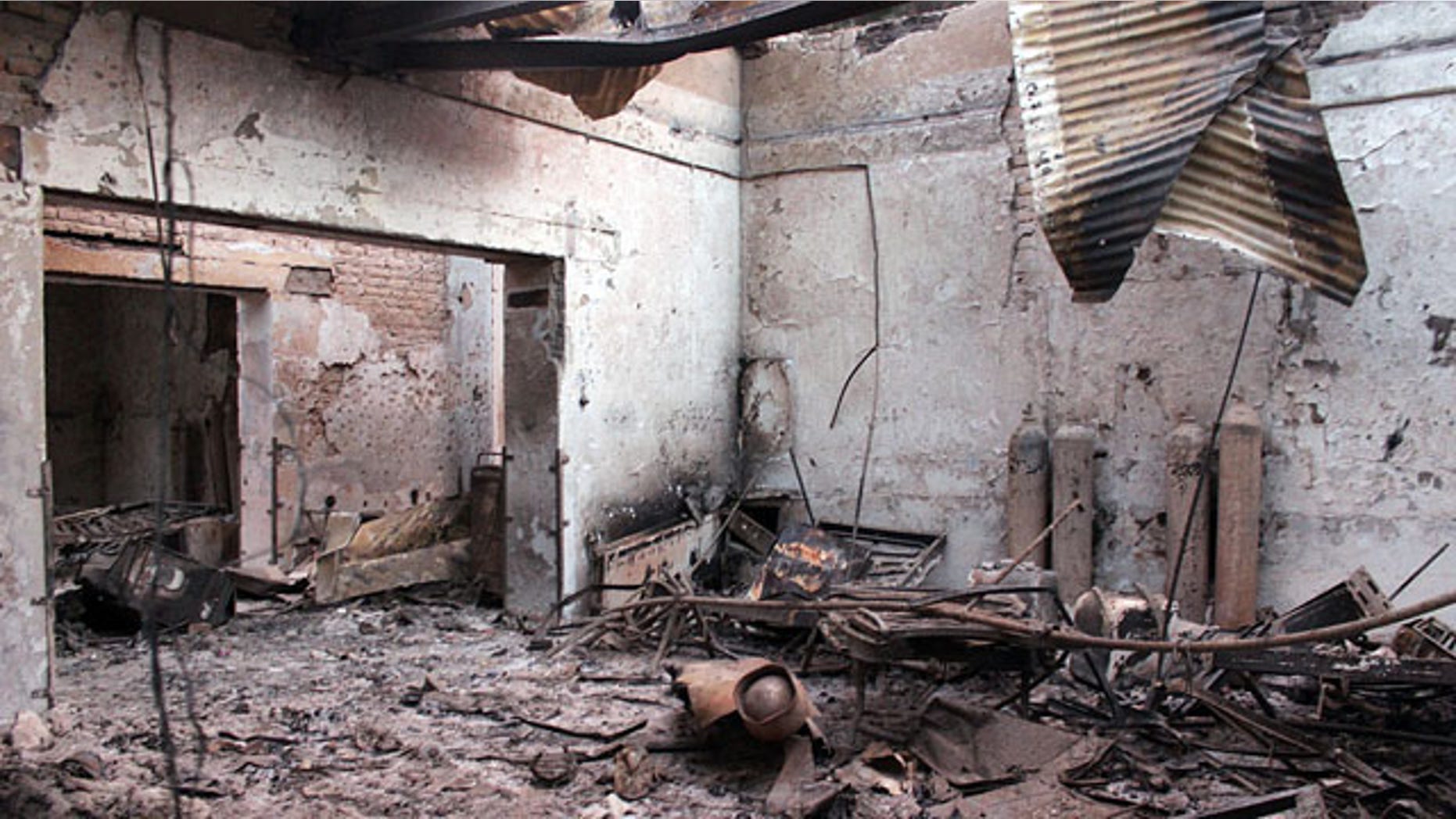 FILE - In this Oct. 16, 2015 file photo, the charred remains of the Doctors Without Borders hospital is seen after being hit by a U.S. airstrike in Kunduz, Afghanistan. (Najim Rahim via AP, File)