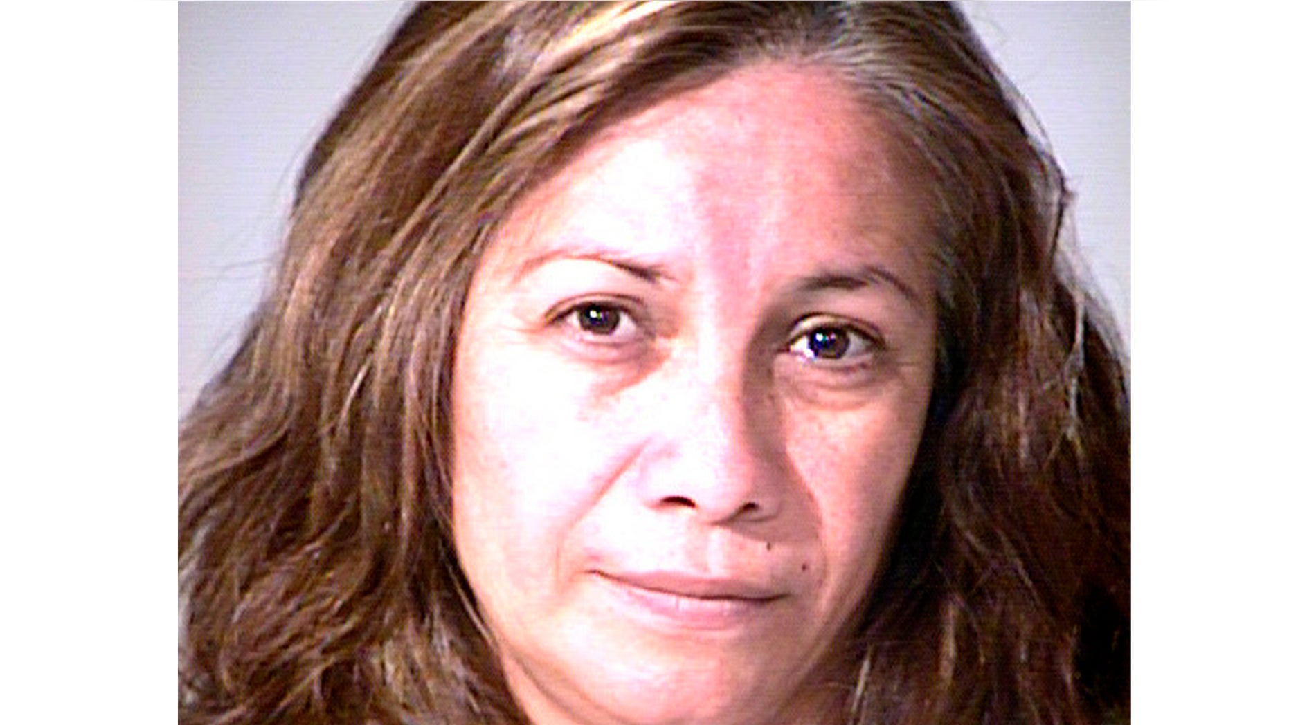 Grisel Ramirez, 48, is seen in custody after she was caught trying to steal a newborn girl from a Southern California hospital in a tote bag.
