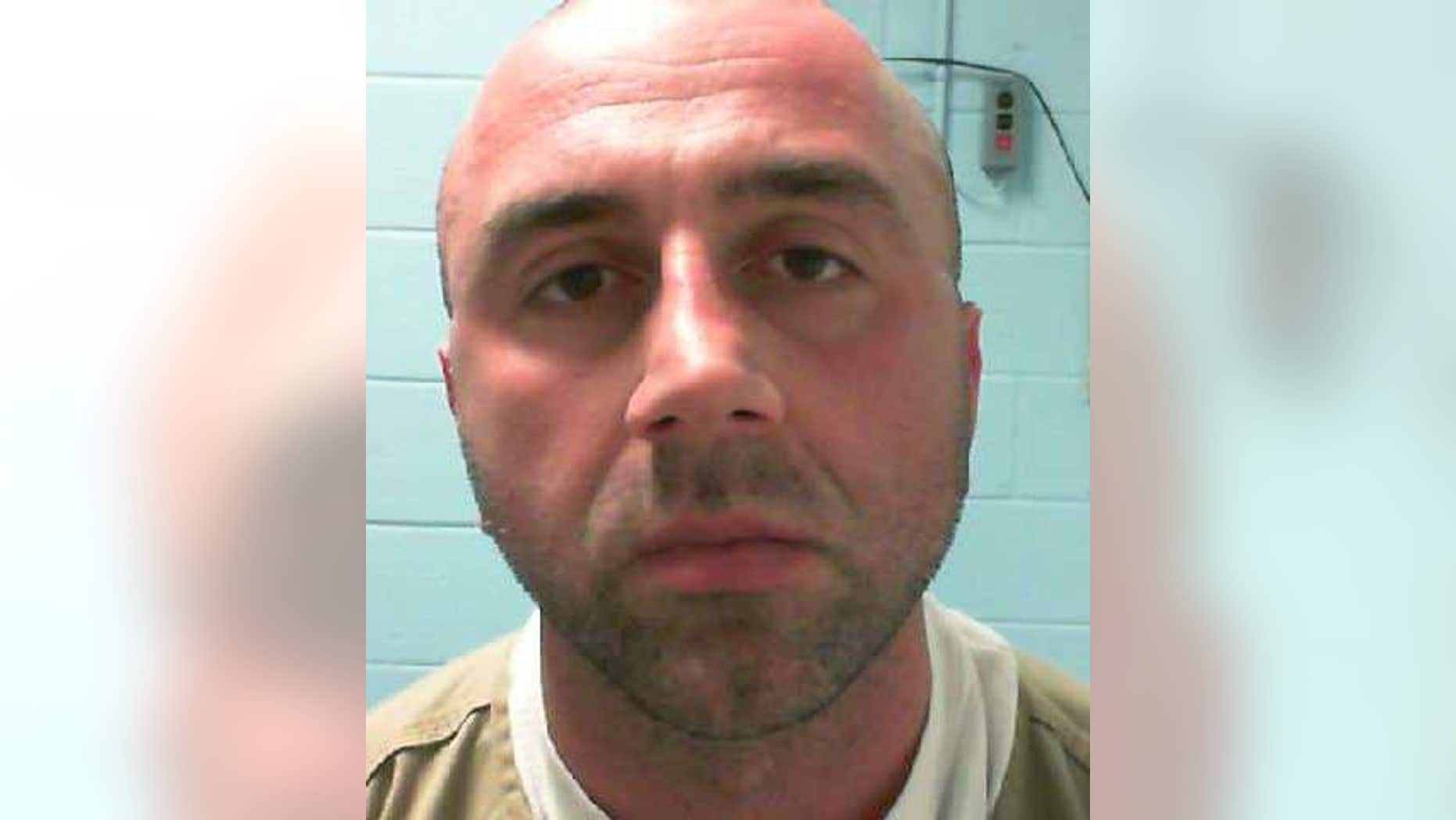 This image, provided by the Putnam County Sheriff's Department, shows 35-year-old Alexandru Hossu.