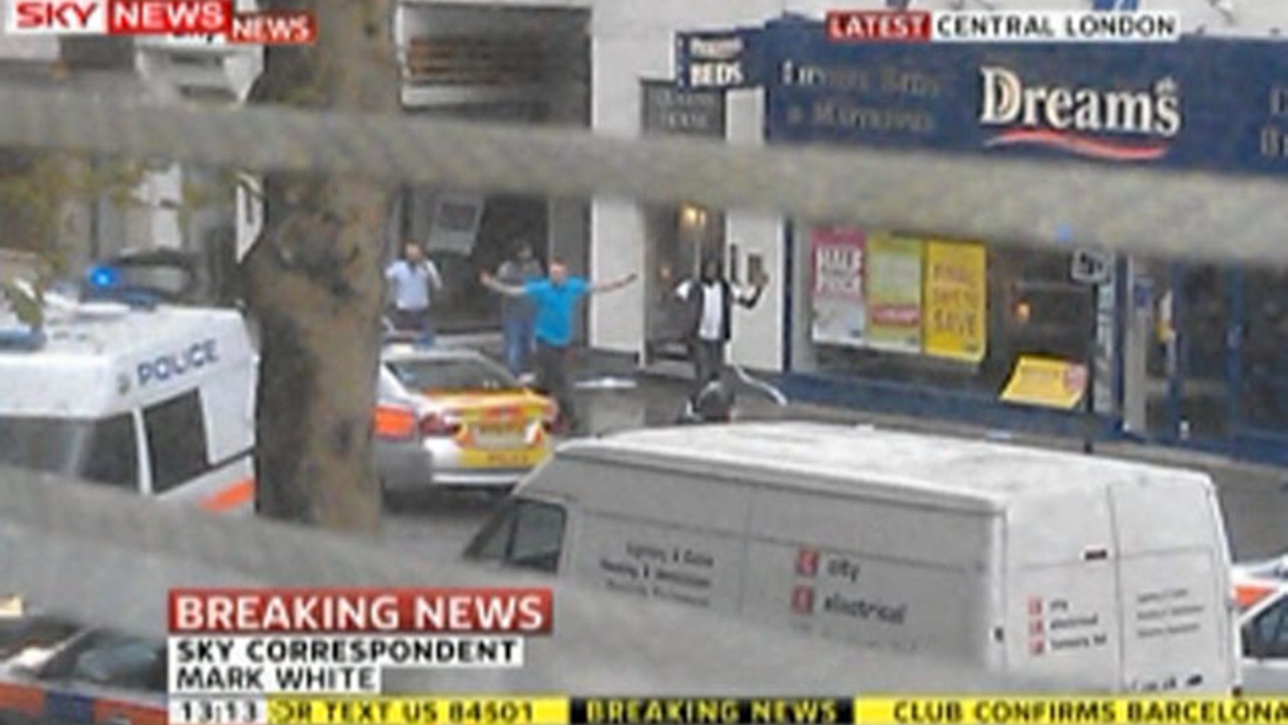April 27, 2012: This screen grab of a SkyNews broadcast shows people being evacuated from a building in central London.