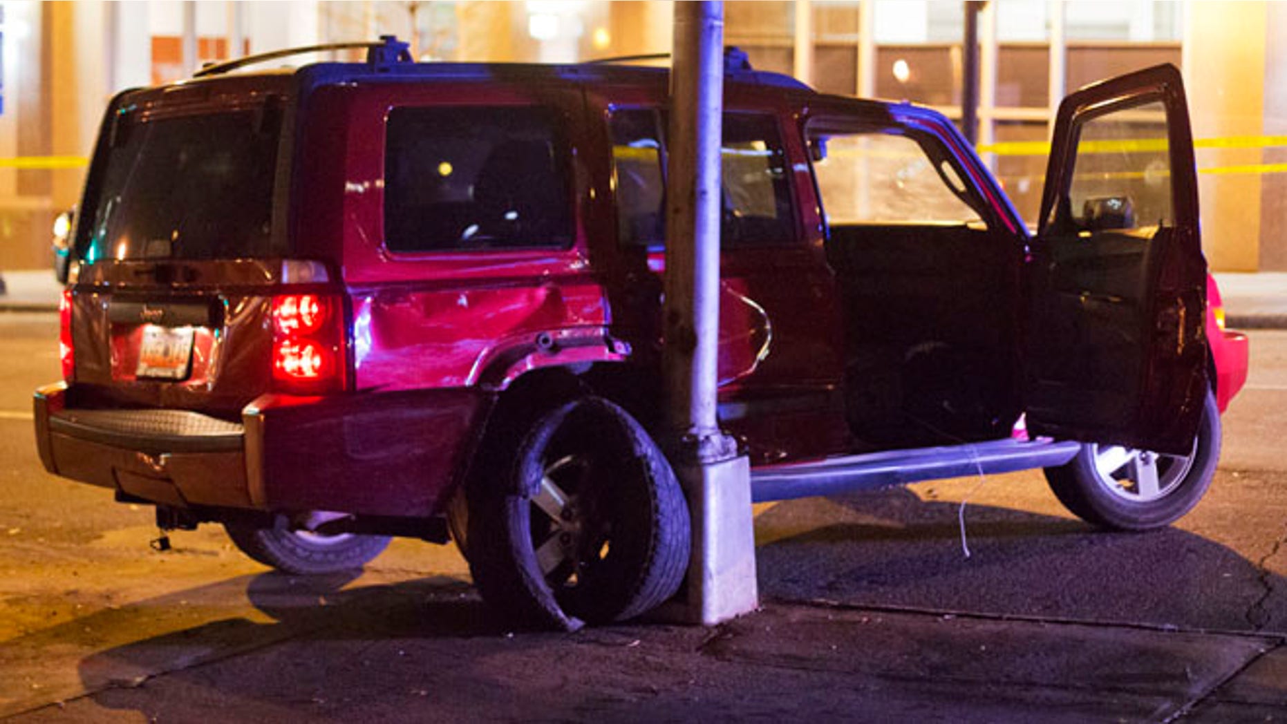 A vehicle is shown at the scene of an officer-involved shooting in downtown Atlanta.