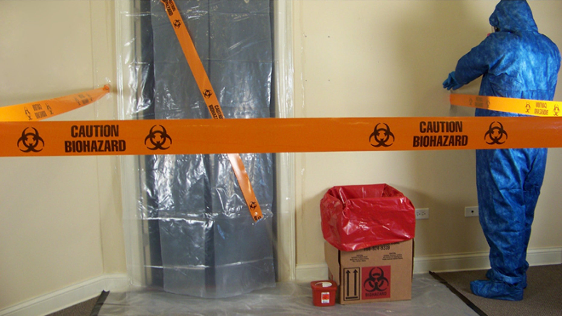 Hotel staffs do not usually have the proper equipment to clean up biohazards, like the equipment being used by this Aftermath employee.