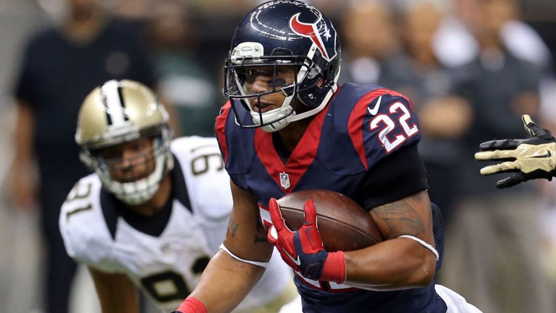 Aug 30, 2015; New Orleans, LA, USA; Houston Texans running back Chris Polk (22) makes a run in the second quarter of their game against the New Orleans Saints at the Mercedes-Benz Superdome. Mandatory Credit: Chuck Cook-USA TODAY Sports