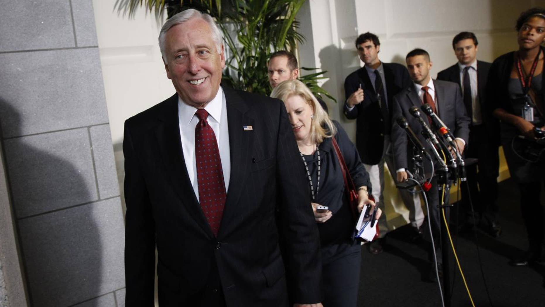 House Majority Leader Rep. Steny Hoyer, D-Md., walks by the microphones after a House democratic caucus meeting. AP Photo/Alex Brandon)