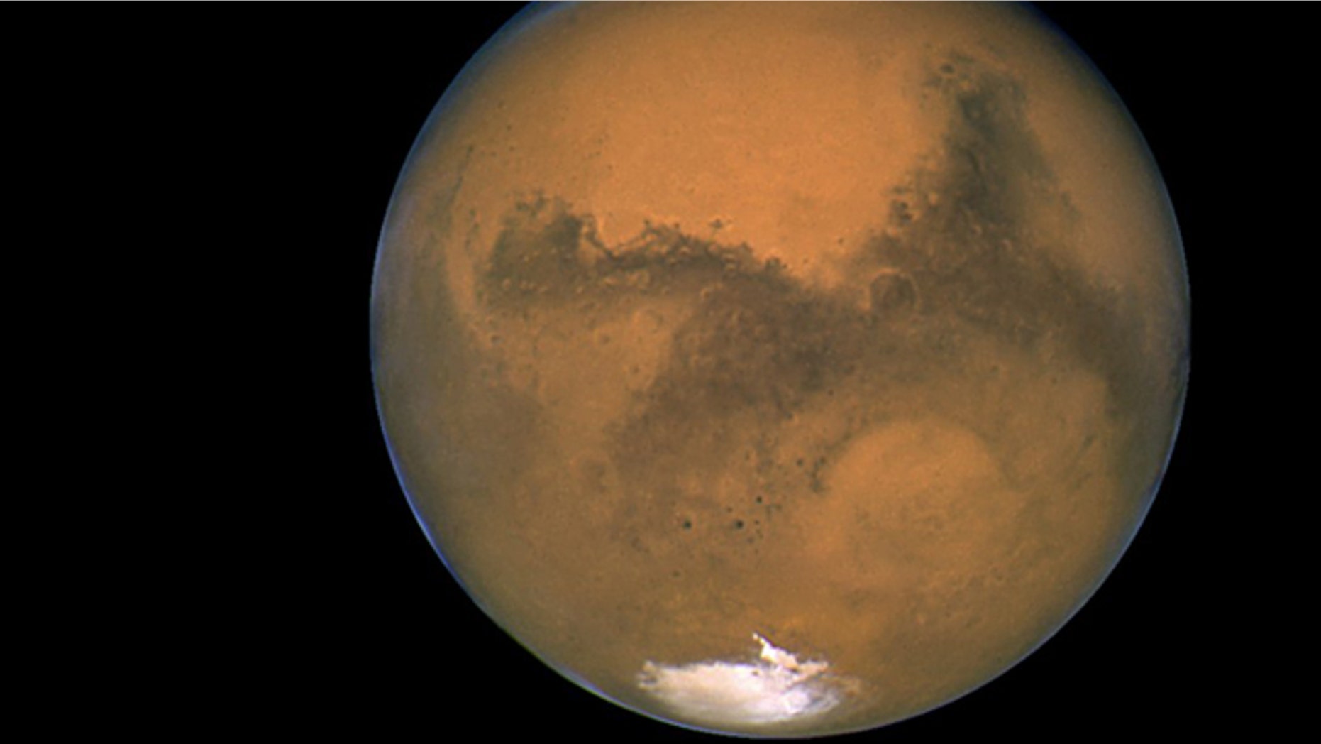 NASA's Hubble Space Telescope took this close-up of the red planet Mars when it was just 34,648,840 miles away, in 2003.