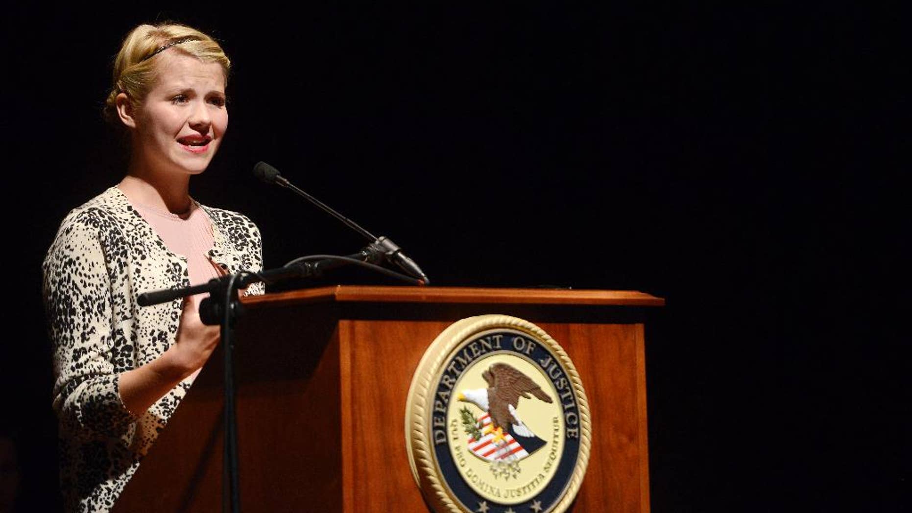 Elizabeth Smart-Gilmour speaks on overcoming adversity and her story of being kidnapped when she was 14, during a conference on violent crime and human trafficking held in Sioux Falls, S.D., Wednesday, Aug 13, 2014. (AP Photo/Argus Leader, Elisha Page)