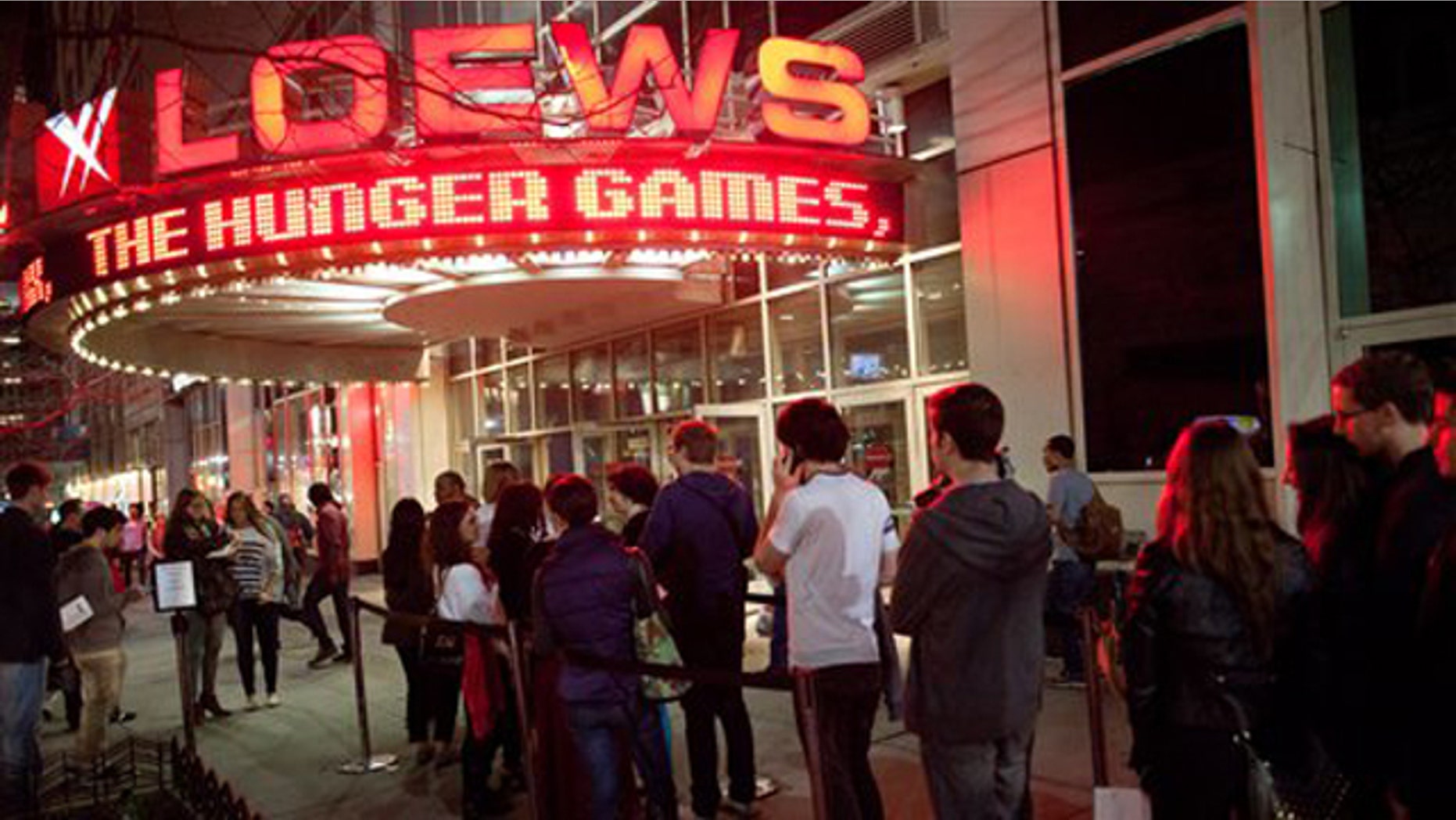 March 22, 2012: Fans line up to see the midnight shows of "The Hunger Games," at the 34th Street Loews AMC Theatre in New York.