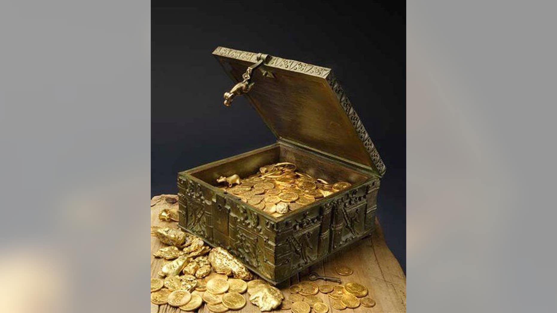 This undated photo provided by Forrest Fenn shows a chest purported to contain gold dust, hundreds of rare gold coins, gold nuggets, and other artifacts.