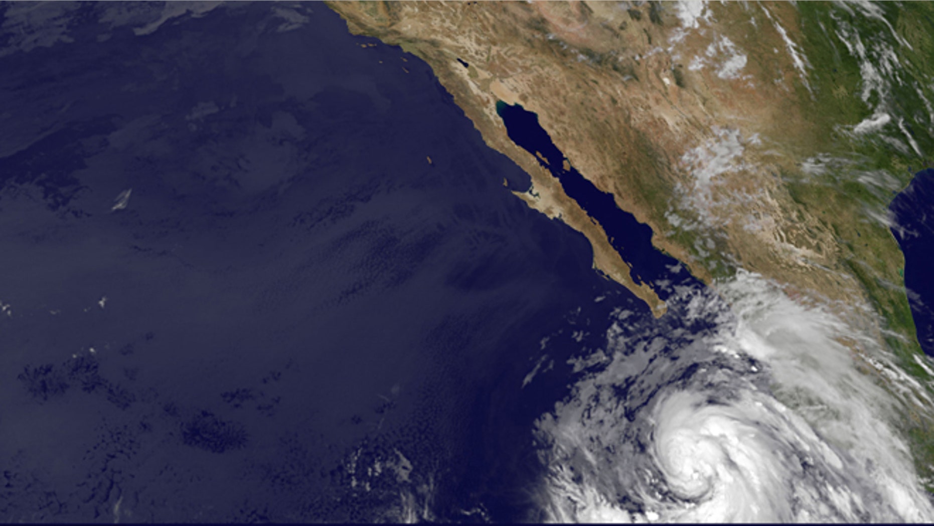 This image provided by NOAA shows tropical storm Cosme taken at 5:00 a.m. EDT Tuesday June 25, 2013. The storm's maximum sustained winds early Tuesday are near 65 mph (100 kph) with additional strengthening expected. Cosme is likely to become a hurricane later in the day as it swirls in the Pacific off Mexico's coast. It is not expected to make landfall.(AP Photo/NOAA)