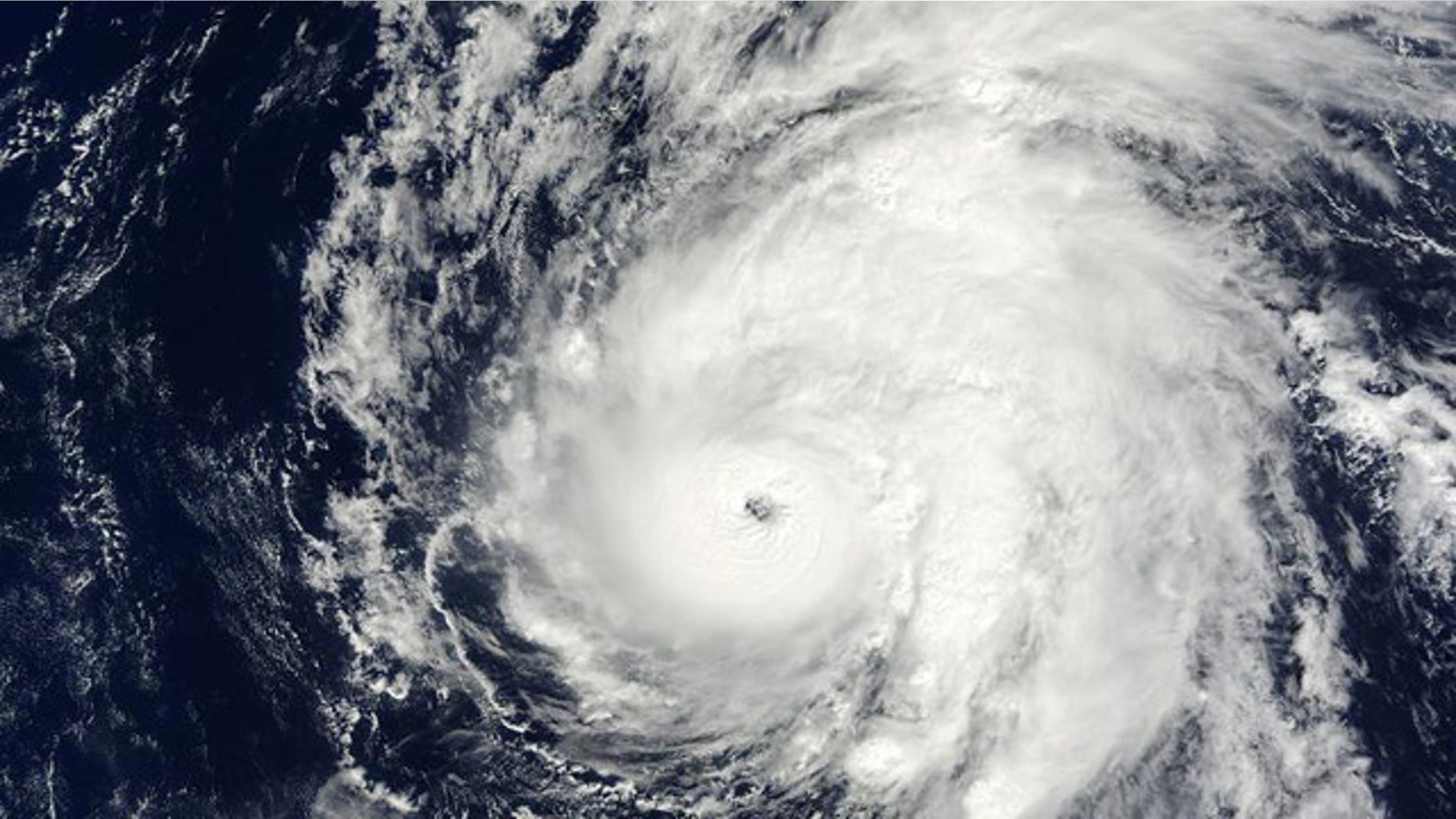 Hurricane Neki swirls through the oceans west of Hawaii.