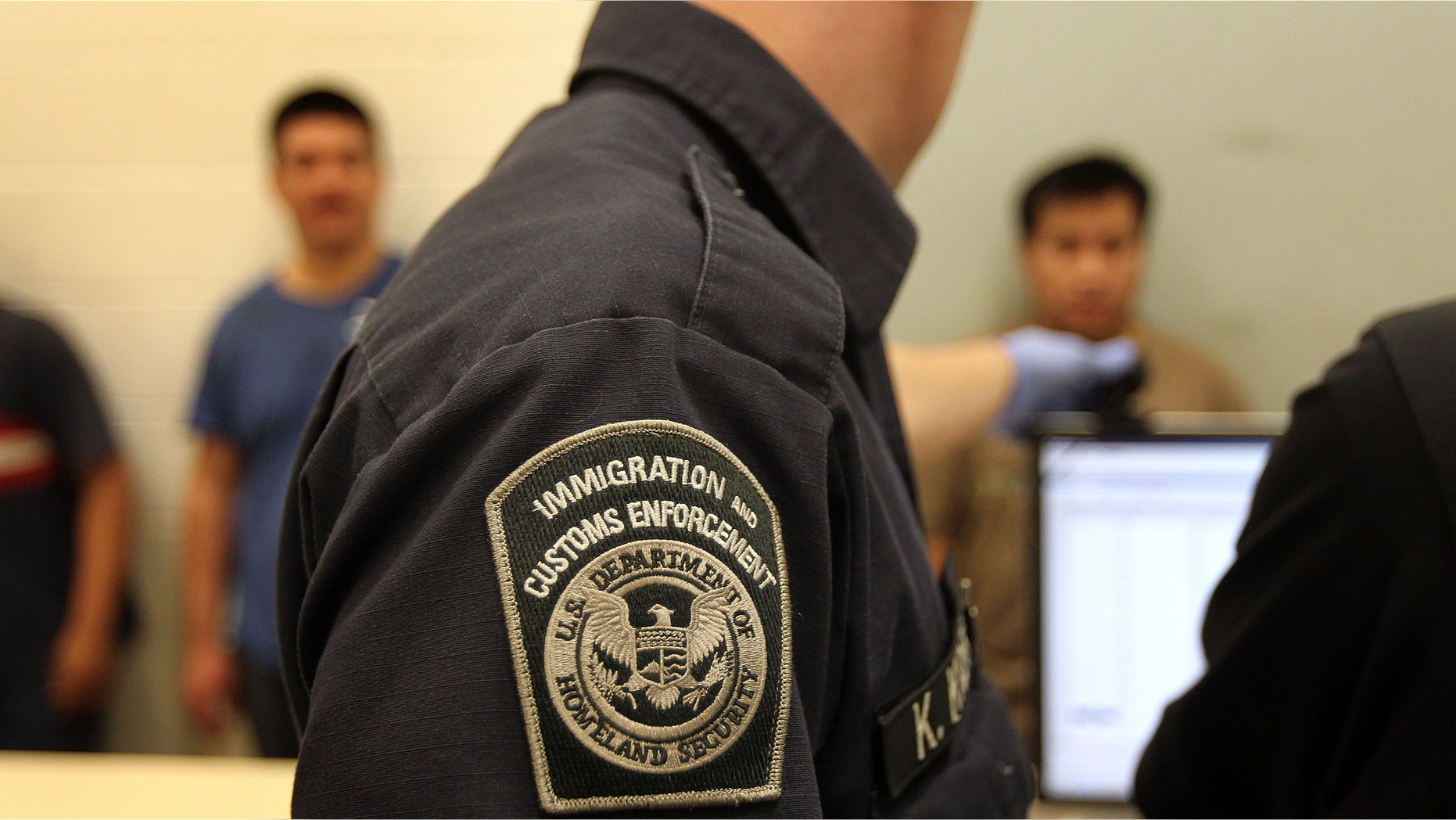 PHOENIX - APRIL 28: Undocumented Mexican immigrants are photographed while being in-processed at the Immigration and Customs Enforcement (ICE), center on April 28, 2010 in Phoenix, Arizona. Across Arizona, city police and county sheriffs' departments turn over detained immigrants to ICE, which deports them to their home countries. Last year ICE deported some 81,000 illegal immigrants from the state of Arizona alone, and with the passage of the state's new tough immigration enforcement law, the number of deportations could rise significantly. (Photo by John Moore/Getty Images)