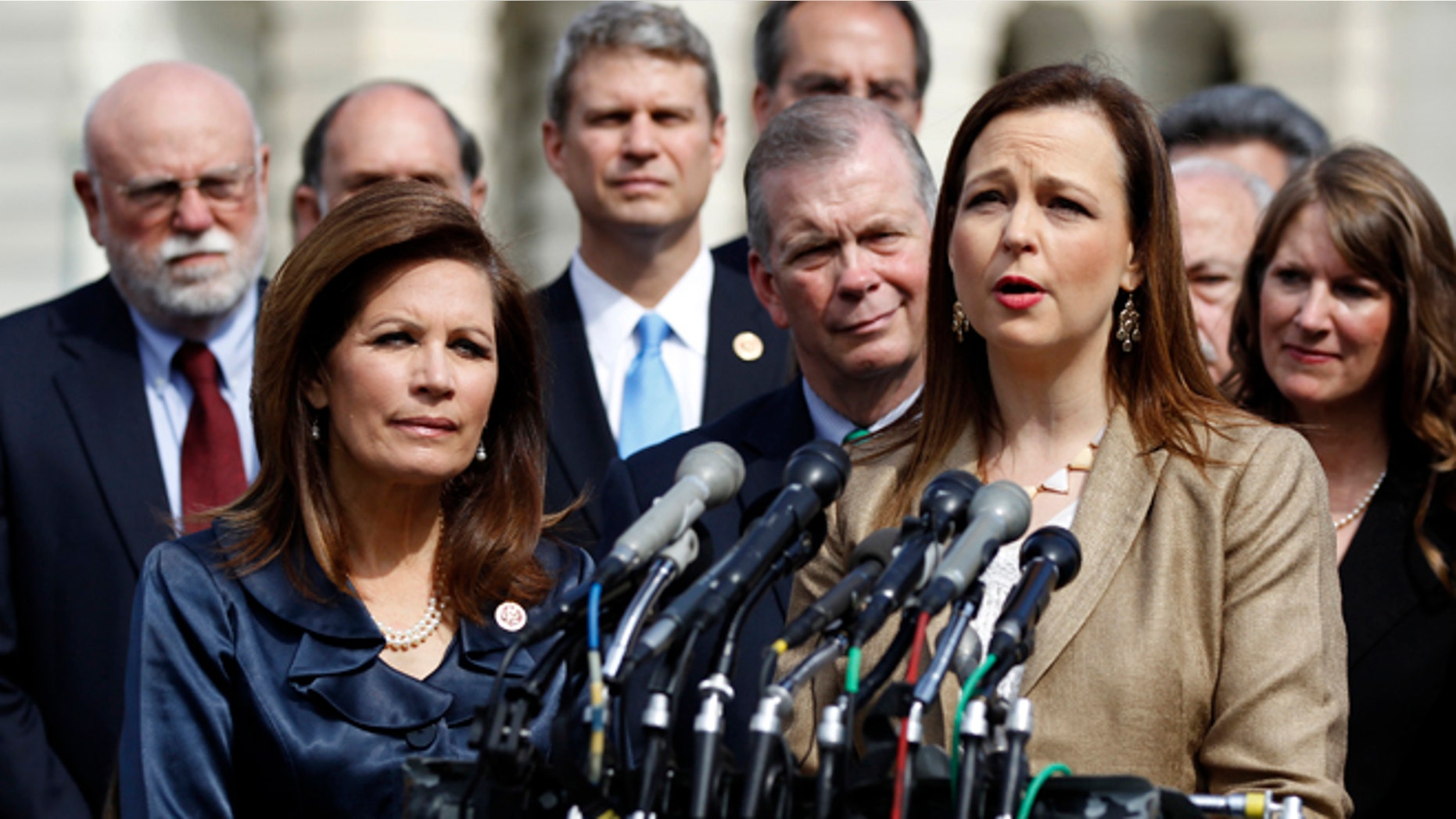 FILE â In this May 16, 2013, file photo Jenny Beth Martin, co-founder and national coordinator of the Tea Party Patriots, speaks during a news conference with Tea Party leaders, including Rep. Michele Bachmann, R-Minn., chair of the Tea Party Caucus, left, about the IRS' targeting Tea Party groups on Capitol Hill in Washington. "I think the IRS' integrity is shattered," said Martin. Tea Party Patriots, a fierce Obama critic, was among the largest nonprofit conservative groups targeted by the IRS; the group raised $20.2 million in 2011, up from $706,000 just two years earlier, according to tax filings. (AP Photo/Molly Riley, File)