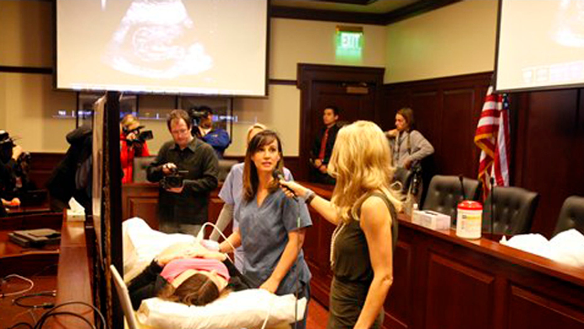 Mar. 21, 2012: Ultrasound technologist Jeanine G. conducts an abdominal ultrasound at the Idaho Statehouse.