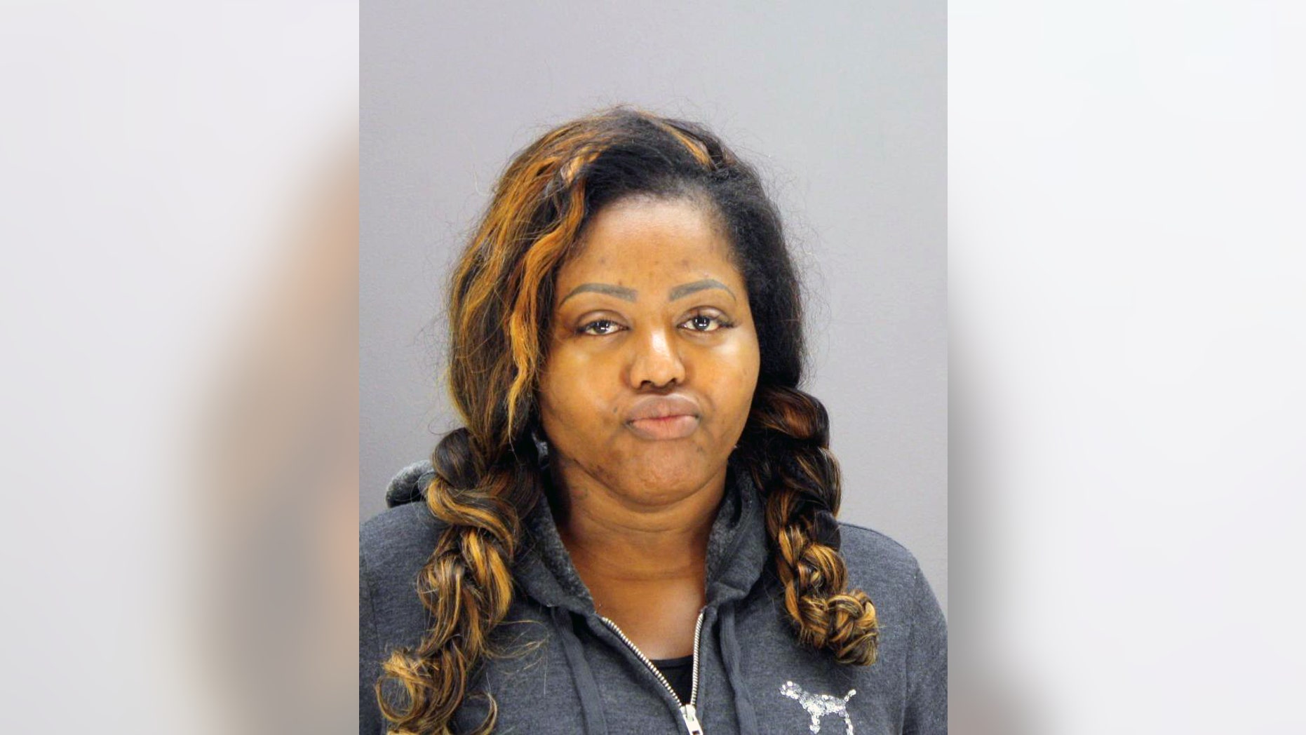This photo provided by the Dallas County Sheriff's Department shows Denise Rochelle Ross. Dallas police say Ross, who is accused of providing illegal buttocks injections, surrendered to authorities Wednesday, March 25, 2015. (AP Photos/Dallas County Sheriff's Department)