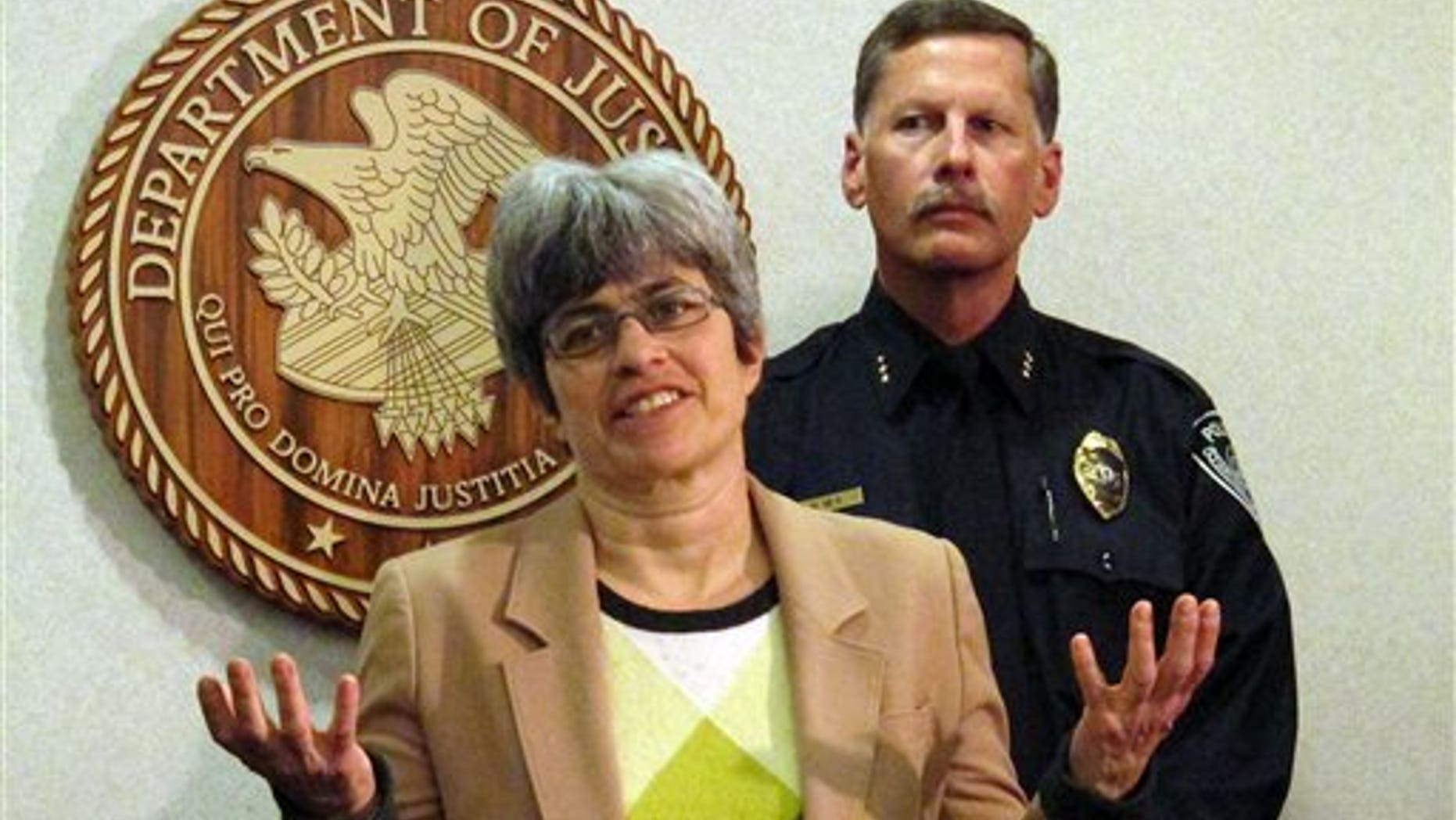 April 22: Karen Loeffler, left, the U.S. Attorney in Alaska and Police Chief Mark Mew address the media at a news conference in Anchorage, Alaska. Authorities say a Mexican national in the U.S. illegally stole another man's identity and became a police officer in Alaska. Mora Lopez had been employed as an Anchorage police officer since 2005 under the name Rafael Espinoza. (AP)