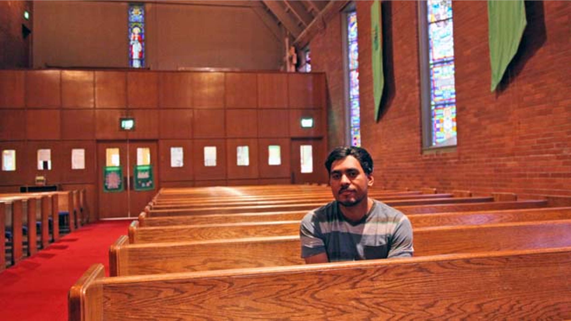 FILE - In this Sept. 24, 2014 file photo Francisco Aguirre Velasquez poses for a portrait at Augustana Lutheran Church in Portland, Ore. Aguirre, an immigrant who took refuge at the church to avoid deportation should be allowed to stay in the U.S. because of a judicial error at a hearing more than a decade ago, his attorney said Monday, July 6, 2015. (AP Photo/Gosia Wozniacka, File)