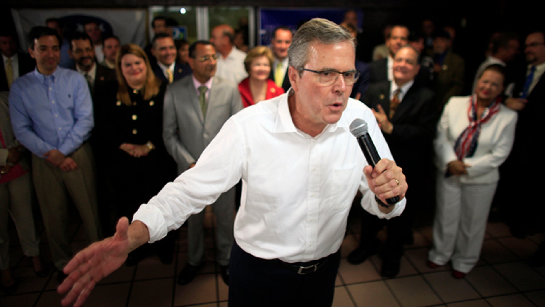 Jeb Bush speaks at a town hall meeting April 28, 2015. Hillary Rodham Clinton's challenge to the GOP on immigration is an early counter to Jeb Bush and other Republican White House contenders seeking Hispanic voters. Among them are GOP lawmakers who once opposed an immigration overhaul in Congress but now say they may be willing to allow millions living in the country illegally to stay. (AP Photo/Ricardo Arduengo)