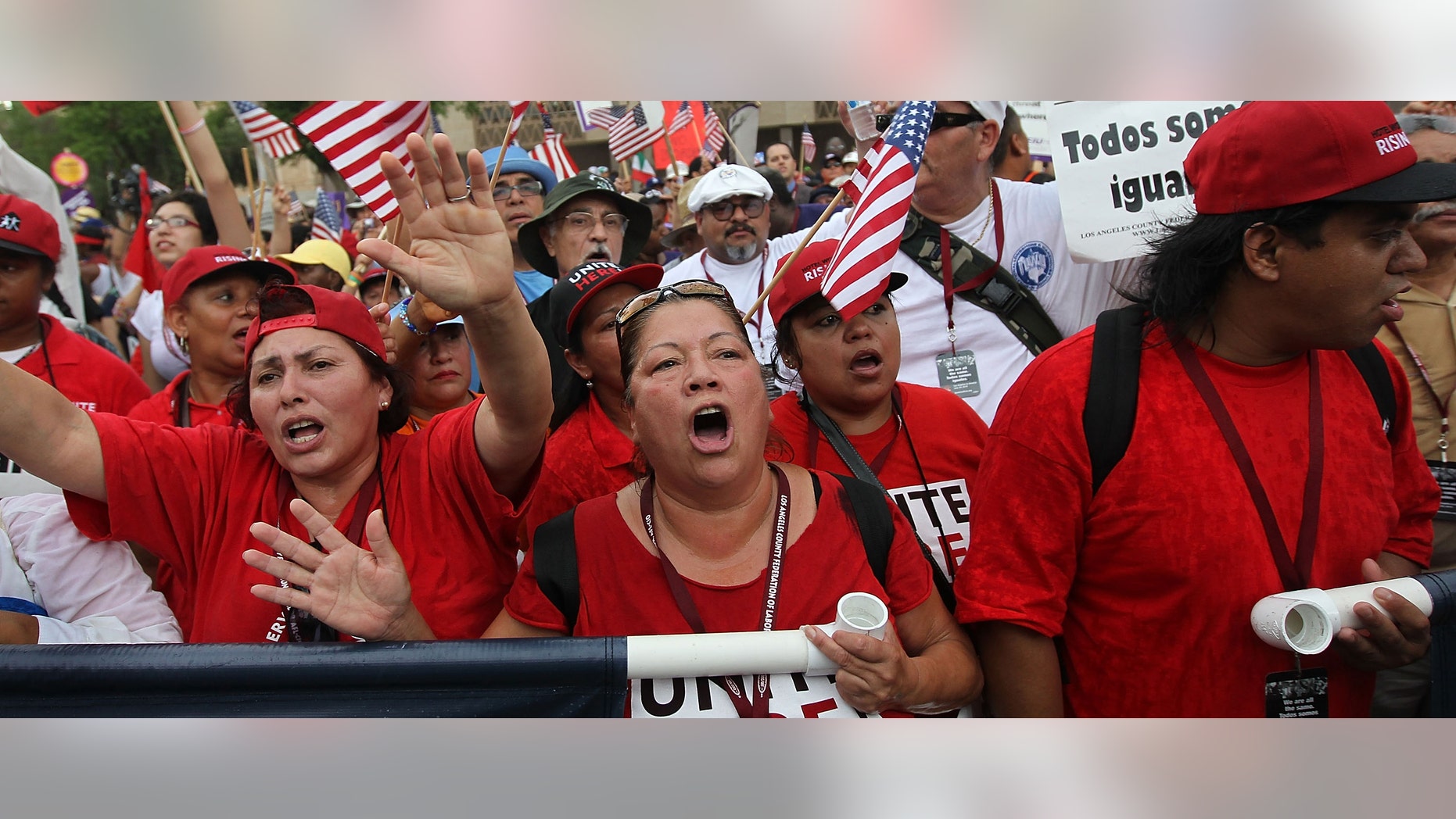 PHOENIX - JULY 29: Protesters from California join Arizonans at the state capitol building for a demonstration against Arizona's immigration enforcement law SB 1070 on July 29, 2010 in Phoenix, Arizona. The Californians came in solidarity with Arizonan opponents of the law, which many people saw as biased against Latinos. U.S. District Court Judge Susan Bolton Wednesday suspended several controversial provisions of the law, which went into effect today. (Photo by John Moore/Getty Images)