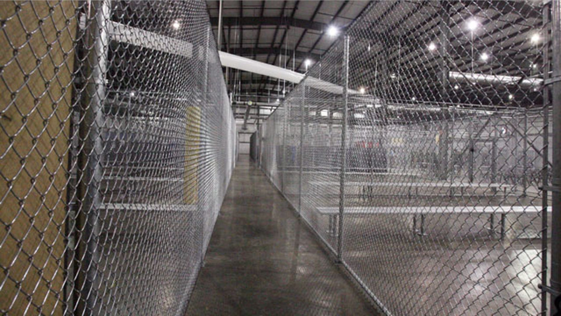 July 17, 2014: This photo shows a new intake facility built to help alleviate overcrowding at the U.S. Customs and Border Protection's McAllen Station in McAllen, Texas. (AP Photo/The McAllen Monitor, Joel Martinez)