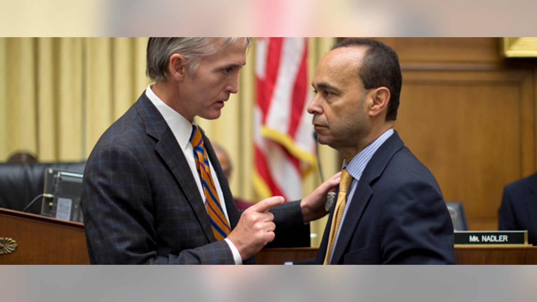 Rep. Trey Gowdy, R-S.C., left, talks with Rep. Luis Gutierrez, D-Ill., on Capitol Hill in Washington.