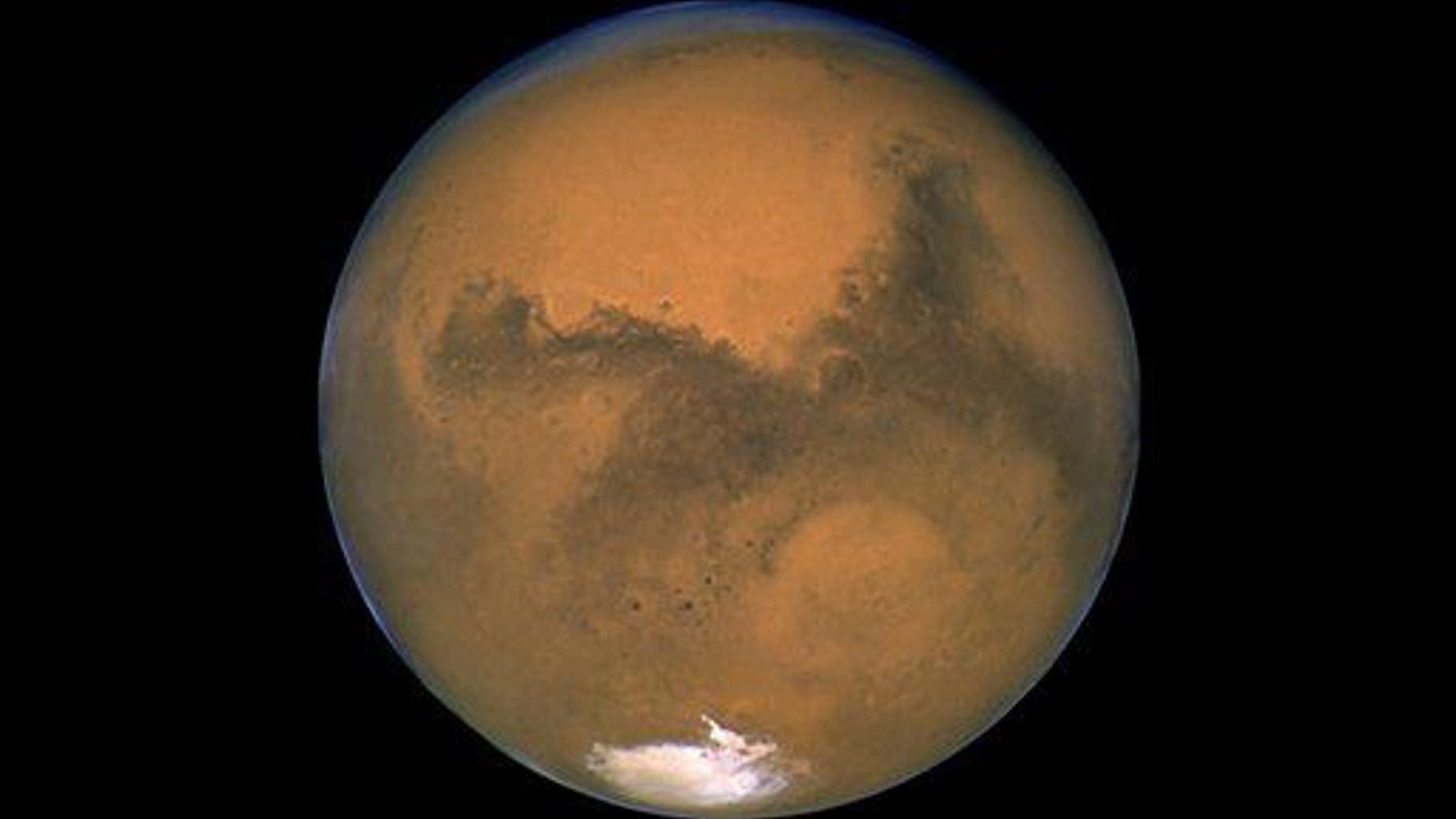 This Aug. 26, 2003 image made available by NASA shows Mars photographed by the Hubble Space Telescope on the planet's closest approach to Earth in 60,000 years.