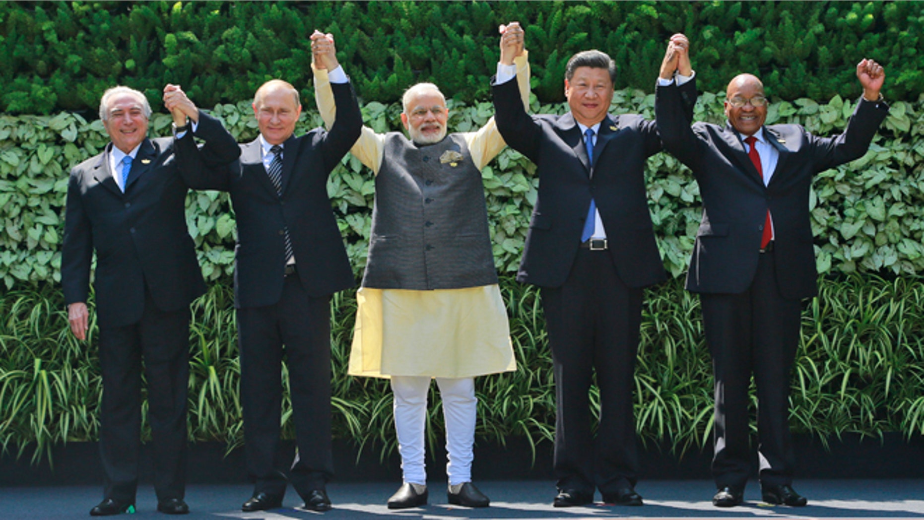 Brazilian President Michel Temer, Russian President Vladimir Putin, Indian Prime Minister Narendra Modi, Chinese President Xi Jinping, and South African President Jacob Zuma in Goa, India, Sunday, Oct. 16, 2016.