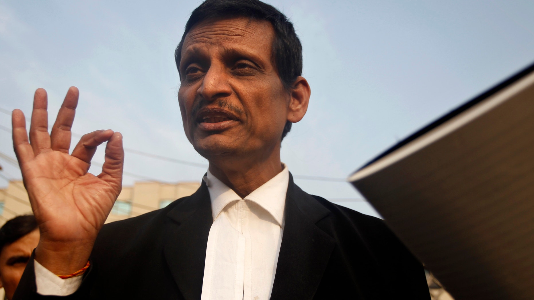 Jan. 14, 2013 - Lal Sharma, lawyer for one of the accused, speaks to journalists outside Saket district court where the accused in a gang rape are to be tried, in New Delhi, India.