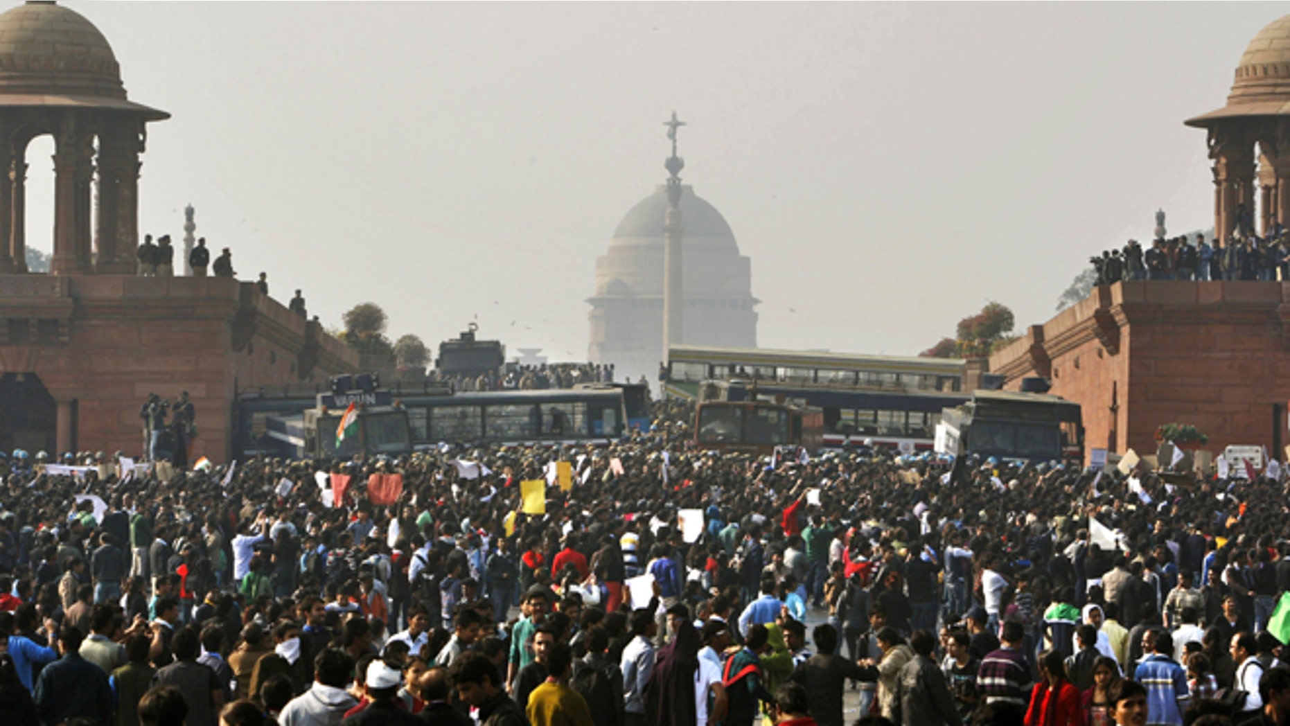 Dec. 22, 2012: In this file photo, protesters gather outside the Indian Presidential Palace during a rally against the gang rape and brutal beating of a 23-year-old student on a moving bus in New Delhi, India.