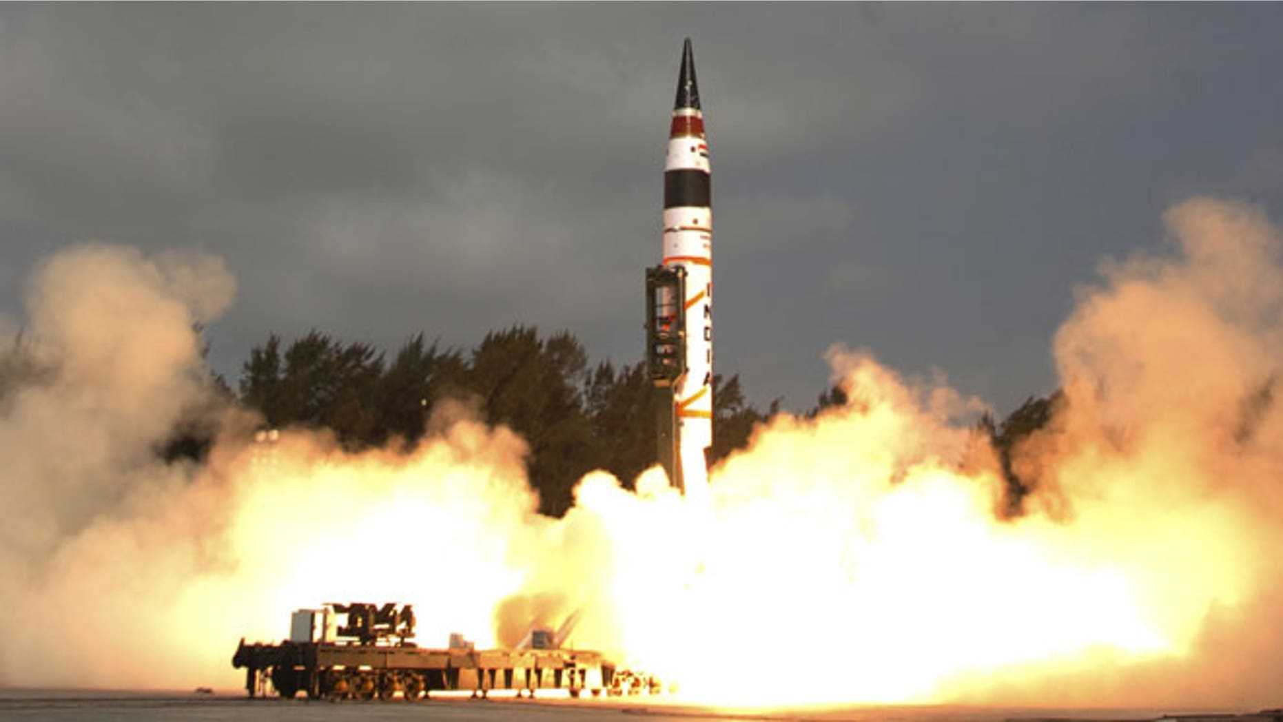 April 19, 2012: This photograph released by the Indian Ministry of Defense shows India’s Agni-V missile, with a range of 3,100 miles, being launched from Wheeler Island off India's east coast.