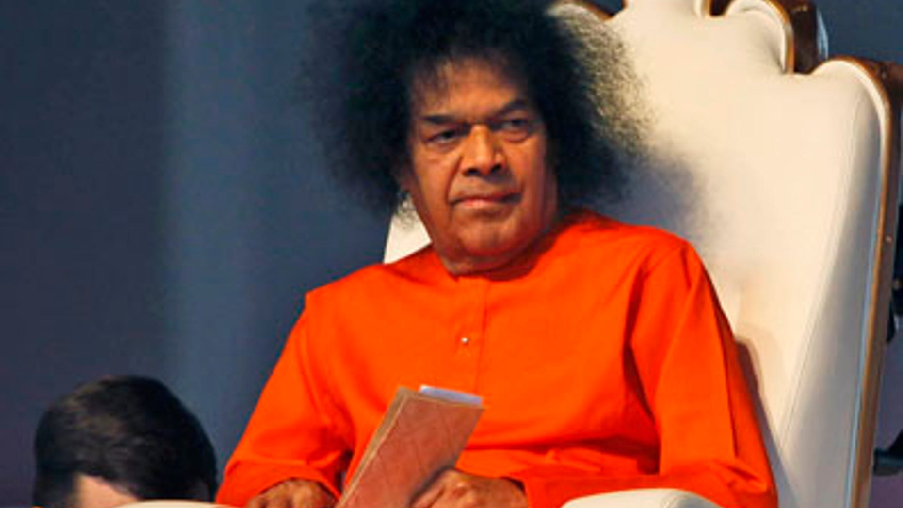 In this April 10, 2010 file photo, Indian spiritual leader Sathya Sai Baba looks on at a function to meet his devotees in New Delhi. Dr. A.N. Safaya says Sathya Sai Baba died Sunday morning, after more than a week on breathing support and dialysis at the Sri Sathya Sai Institute of Higher Medical Sciences. (AP/File)
