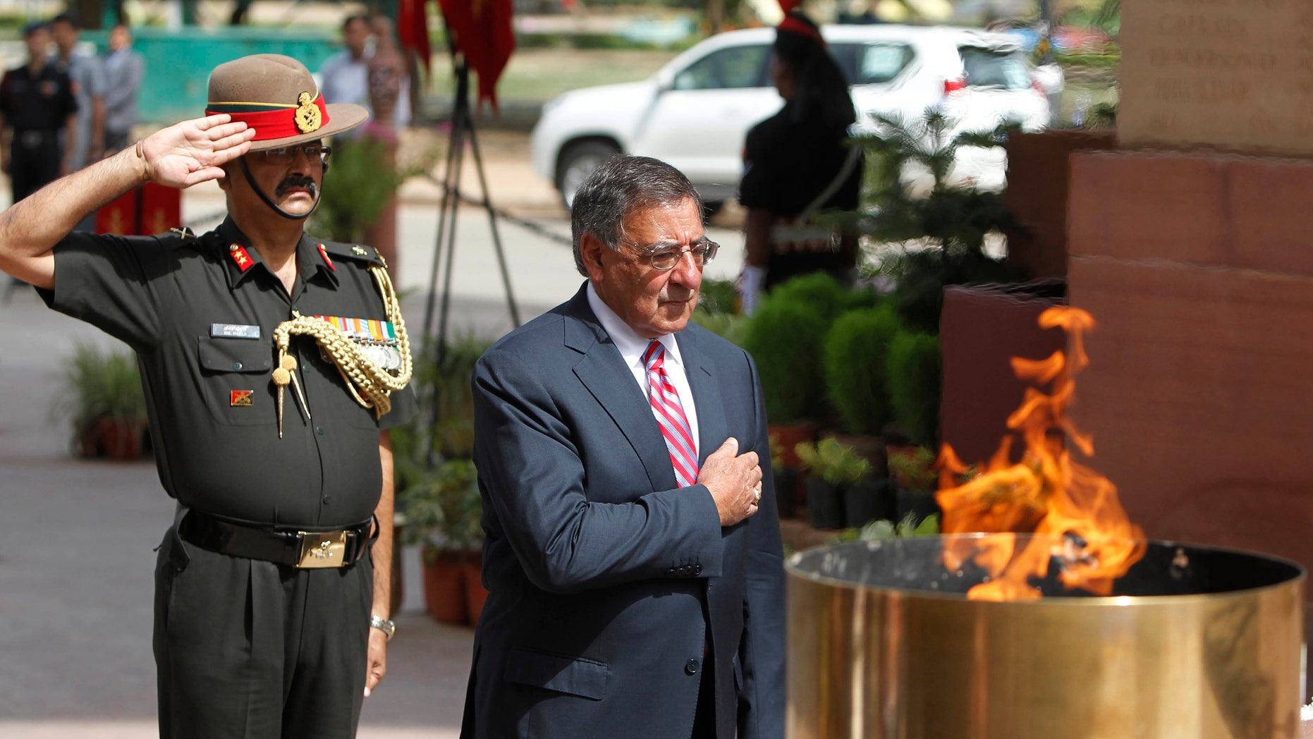 June 6, 2012: U.S. Defense Secretary Leon Panetta pays tribute at the India Gate war memorial monument, in New Delhi, India. Panetta is urging leaders of India to play a more robust role in Afghanistan, as U.S. tensions with Pakistan, India's arch-rival, continue to churn.