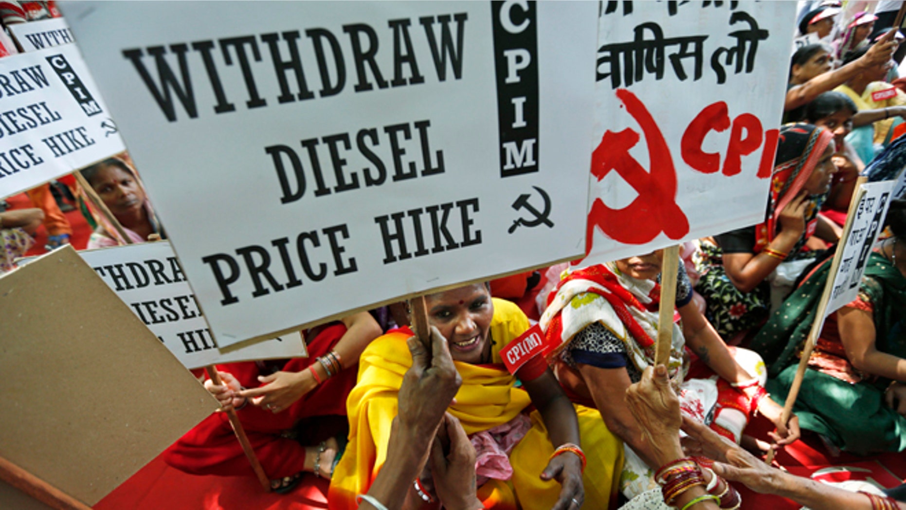 Sept. 20, 2012: Supporters of Communist Party of India (Marxist) participate in a protest with placards in New Delhi, India.
