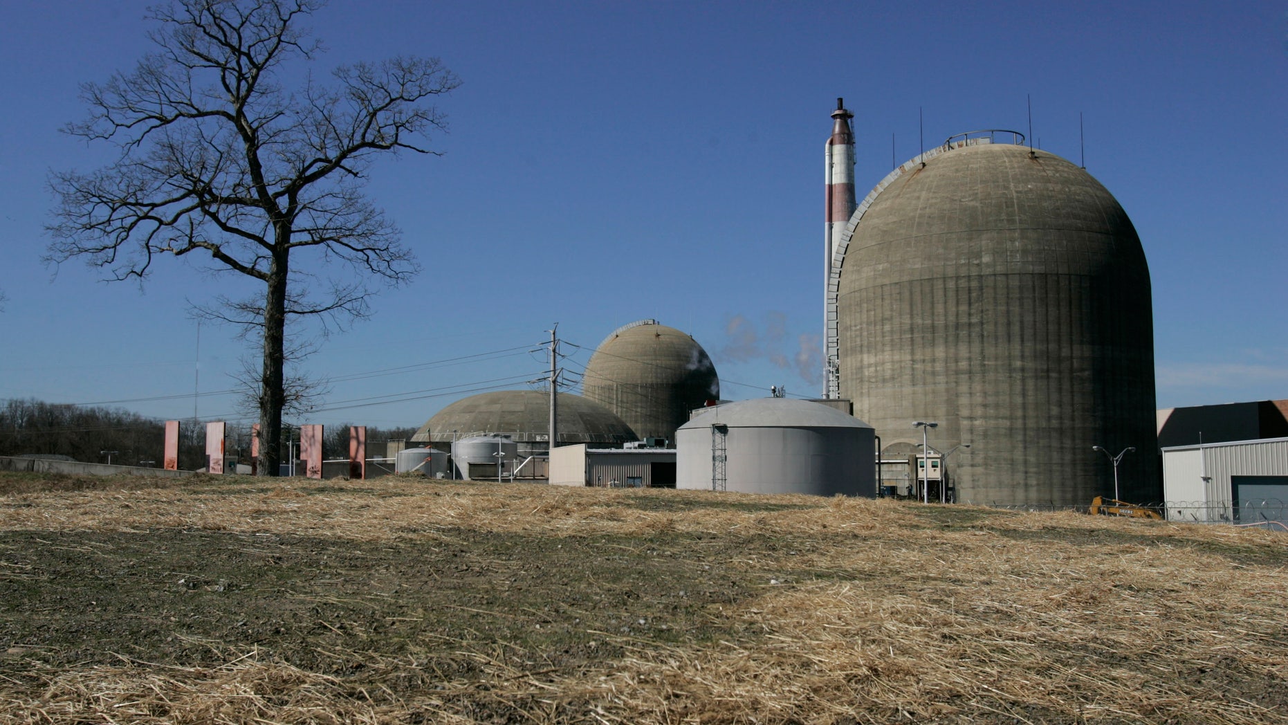 In this file photo, Indian Point nuclear power plant's containment silos, seen here, rise above the skyline along the Hudson River in Buchanan, N.Y. Indian Point 2 is now back online after a Nov. 7 transformer explosion shut down the plant.